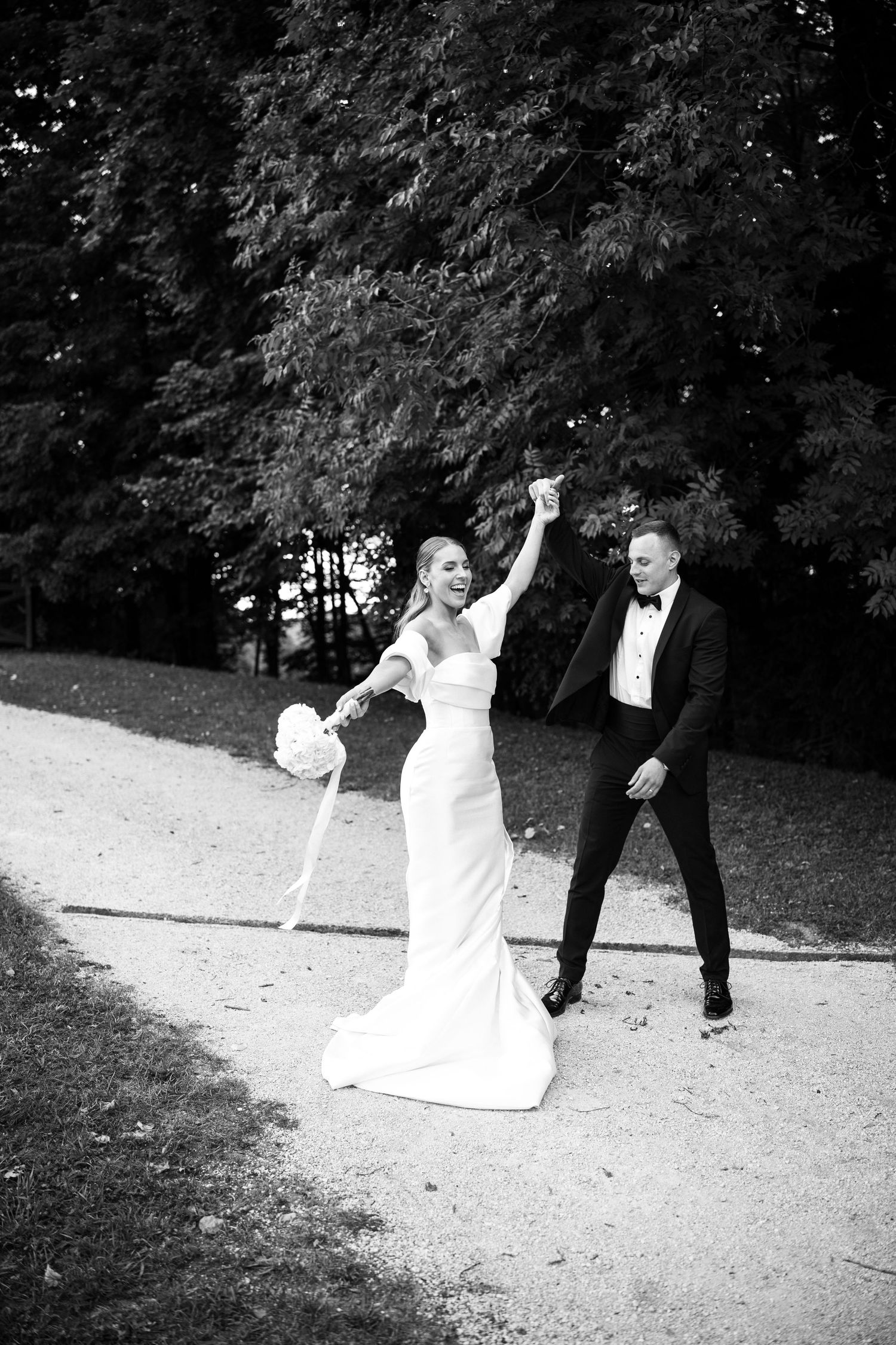 Dynamic black and white sequence showing playful moments during a wedding photoshoot.