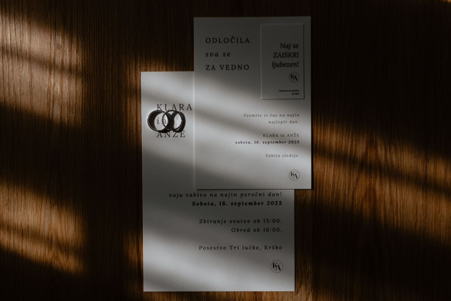 A series of blurred documents or papers arranged in a sequence with dramatic lighting and shadows.