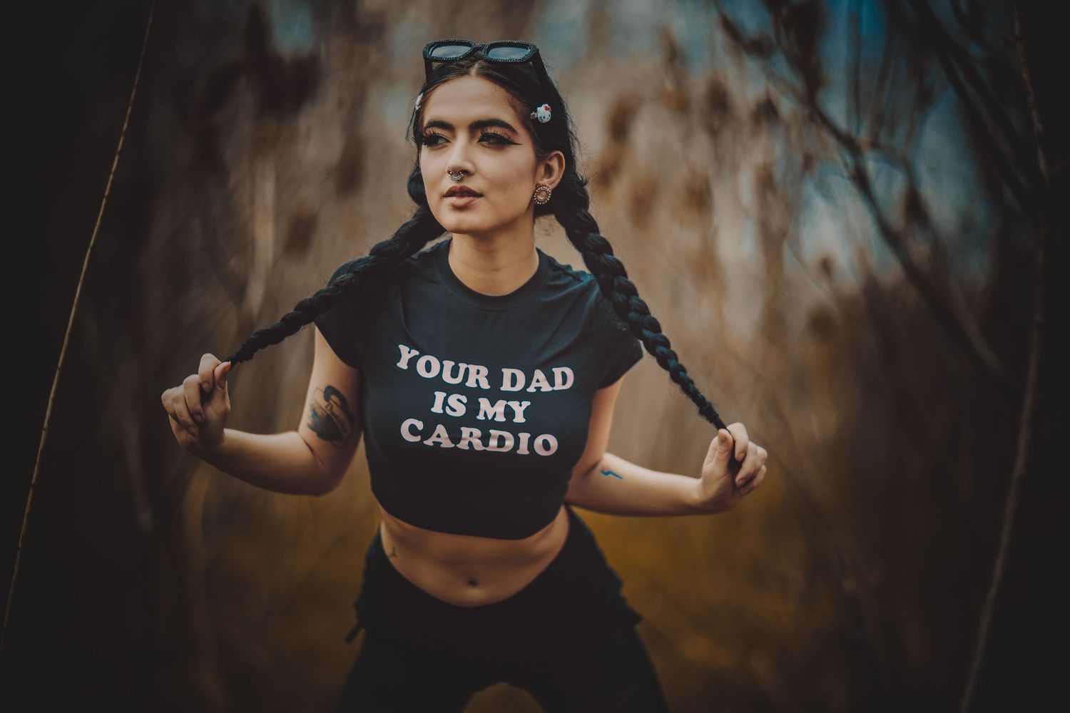 Outdoor fitness photoshoot in autumn featuring workout attire and dynamic poses.