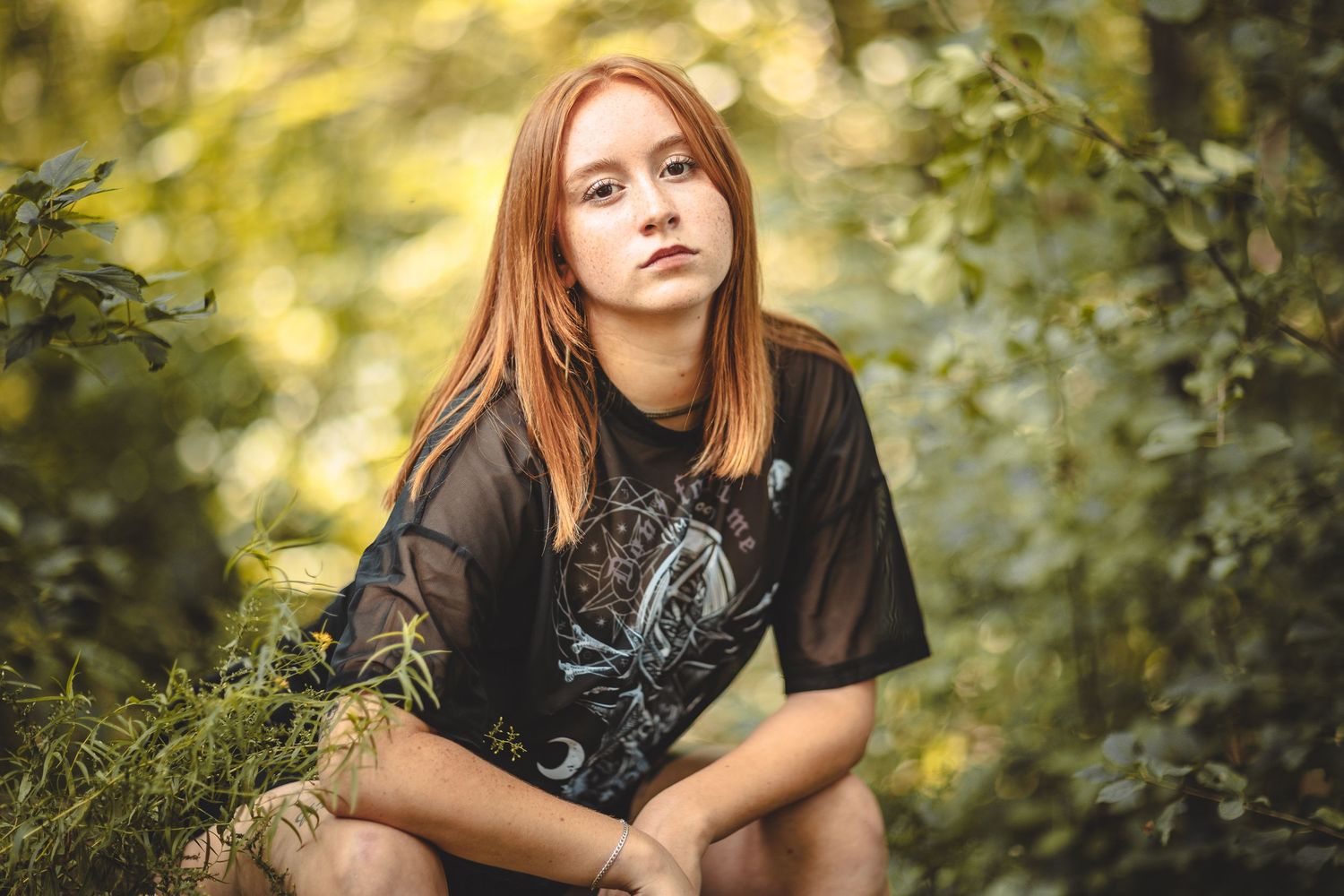 Outdoor portrait series in golden sunlight with natural forest backdrop.