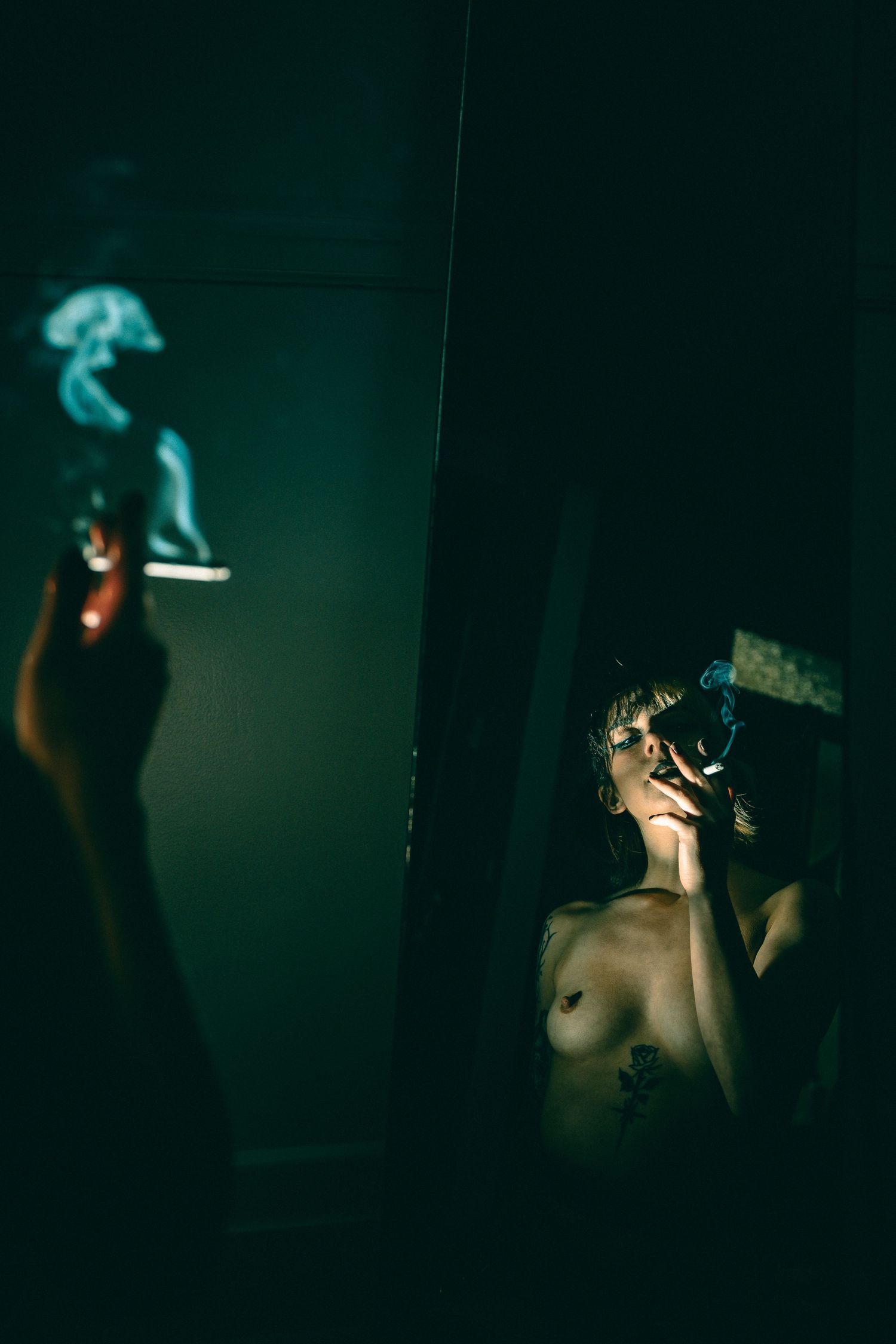 Dark moody photo series with silhouettes and turquoise lighting creating an atmospheric nighttime ambiance.