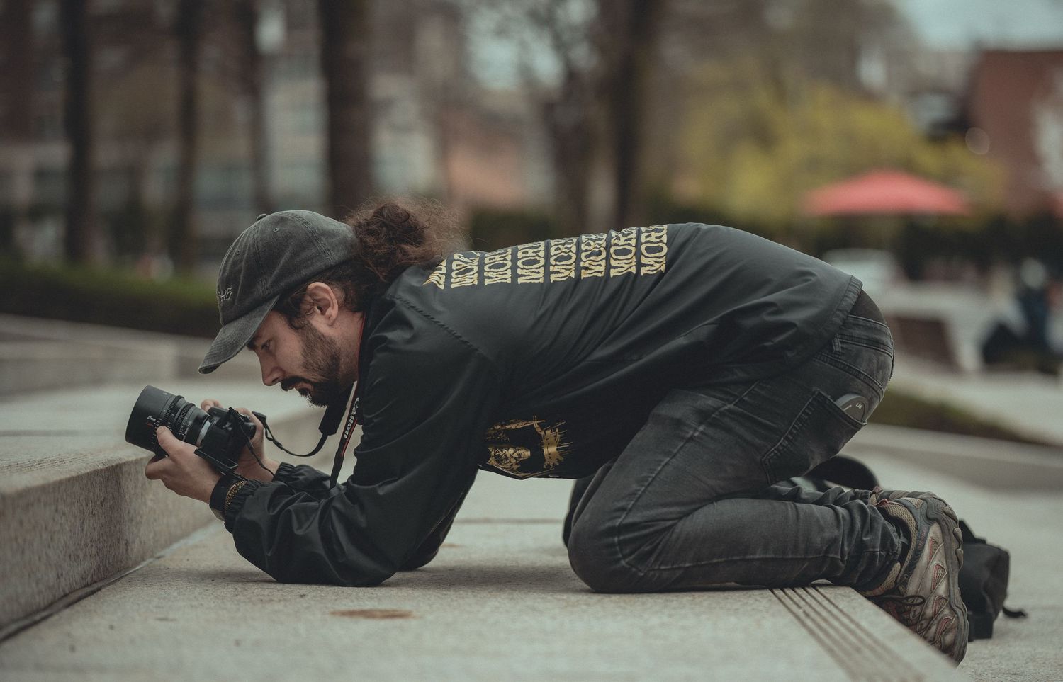 Creative low-angle photography poses on concrete steps showing unique perspectives.