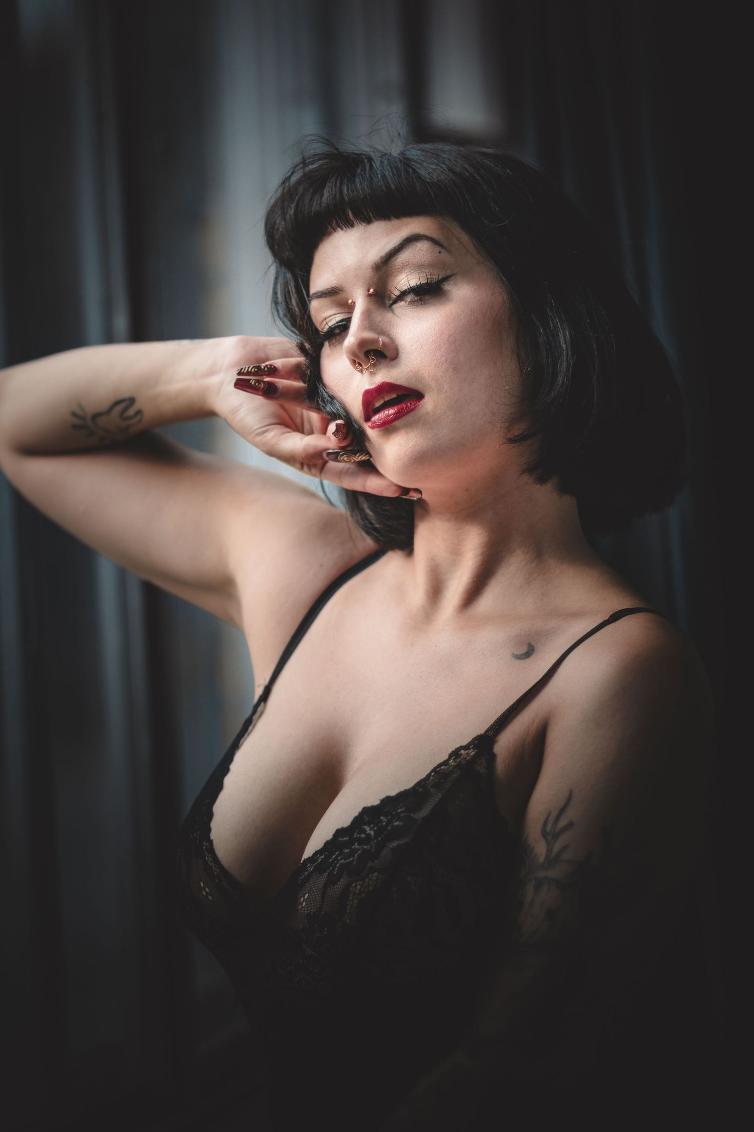 Artistic black and white portrait series with dramatic shadows and intimate poses.