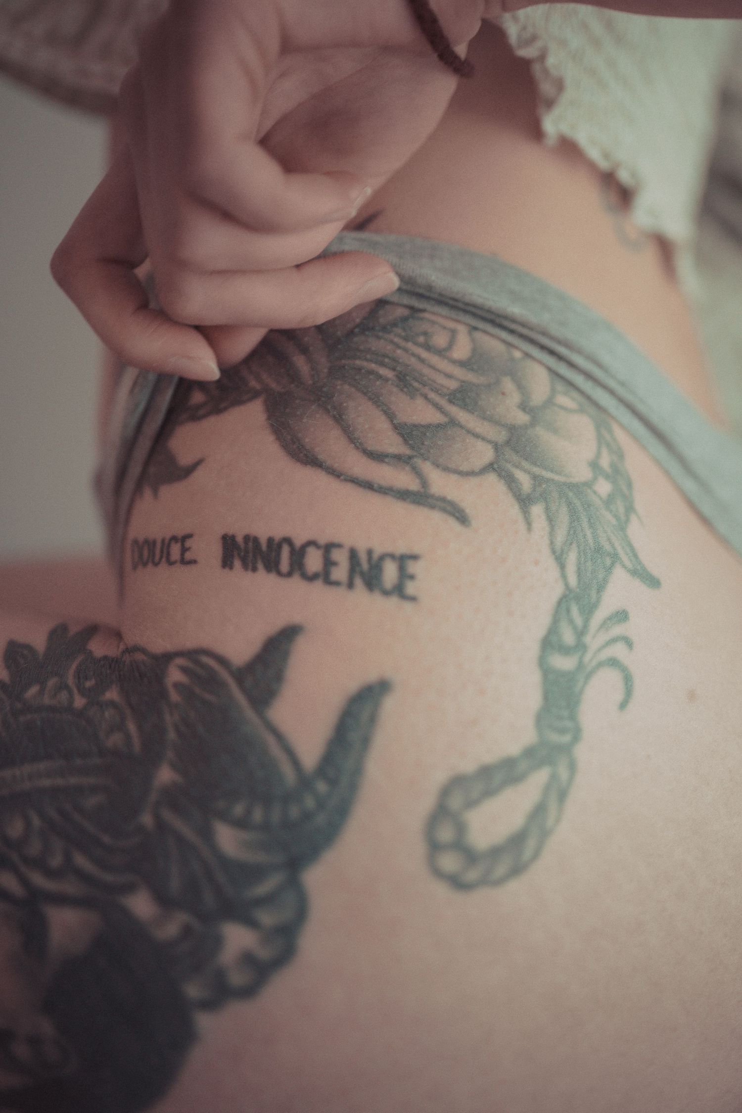 Close-up sequence of tattoo artwork on skin.