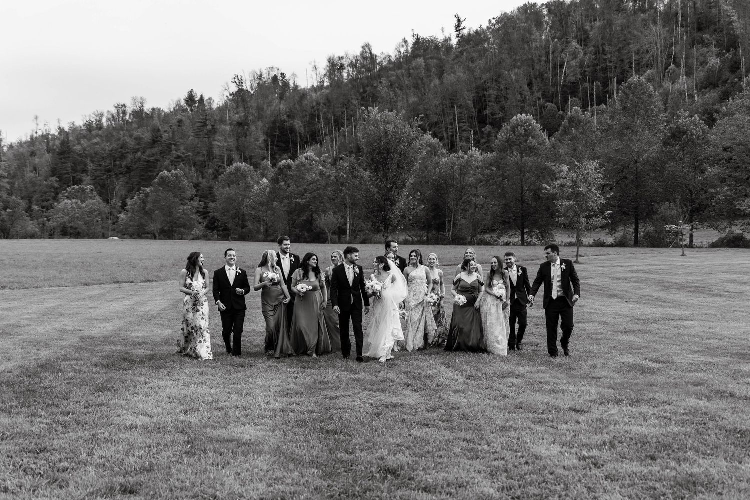bridal party walking at The Barn on New River