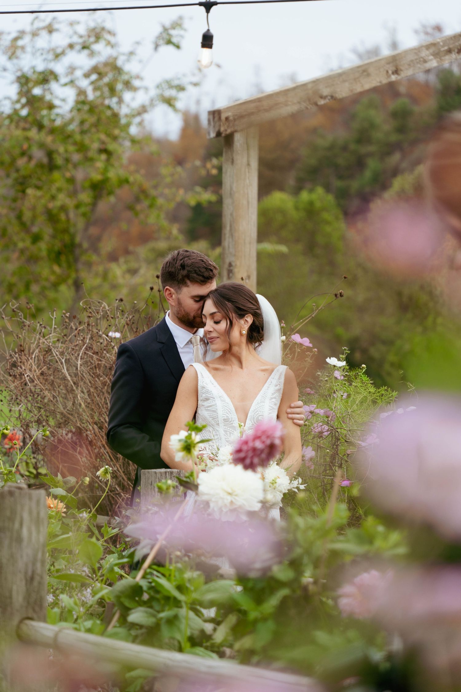 Bride and groom in the garden at The Barn on New River