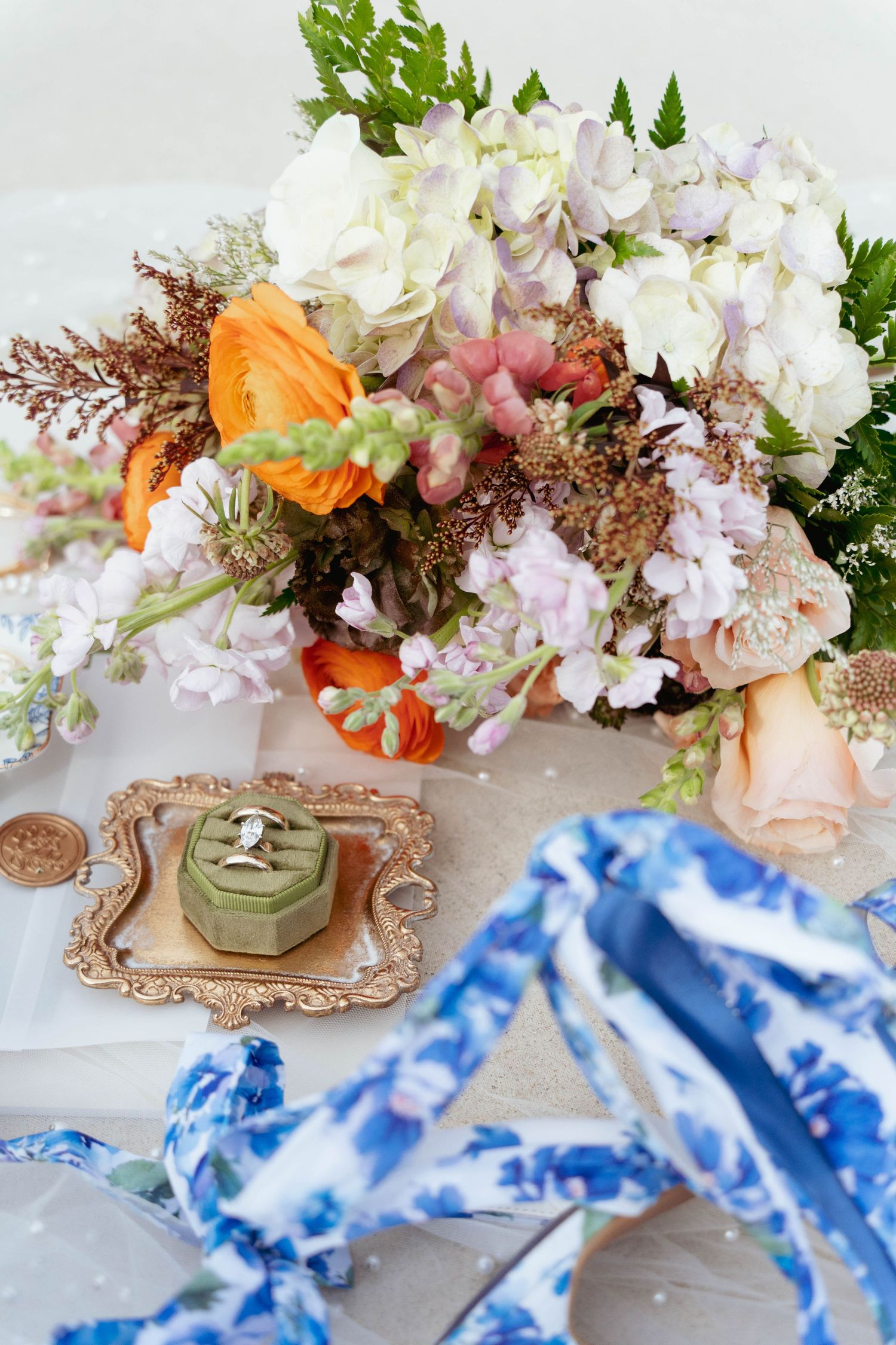 Flatlay with flower bouquet at The Maola at Riverside