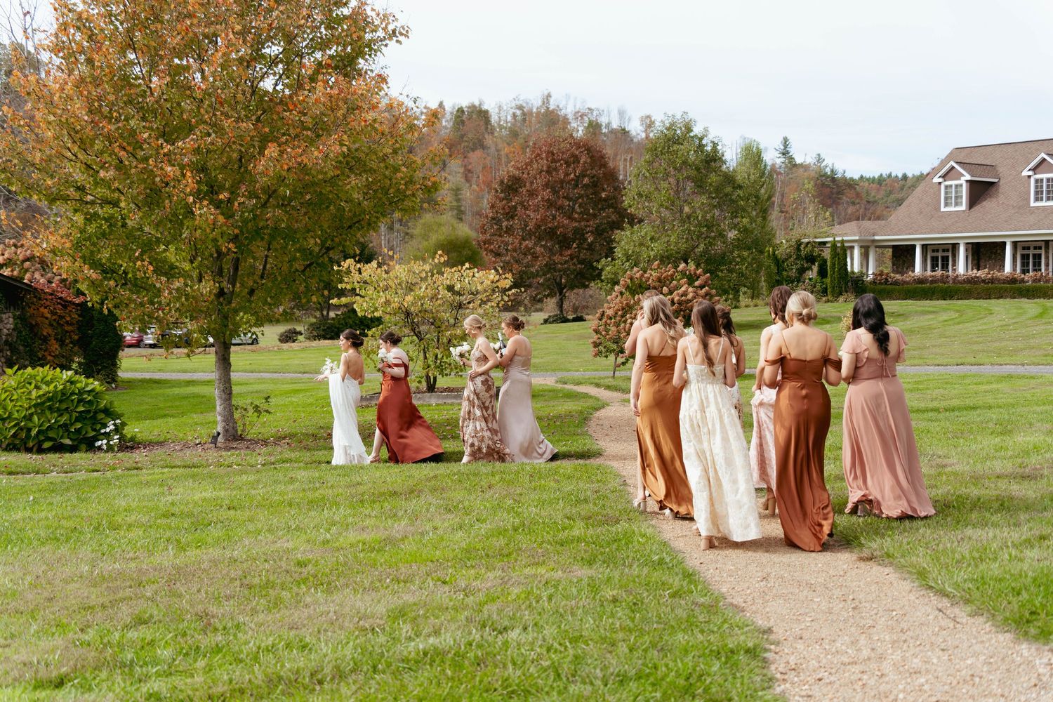 Bridesmaids walking at The Barn on New River