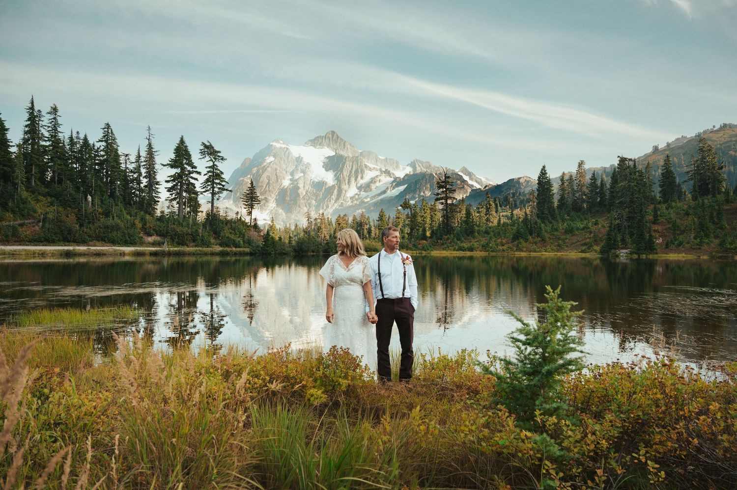 A panoramic series of mountain lake views with evergreen trees and snow-capped peaks reflecting in calm waters at sunset.