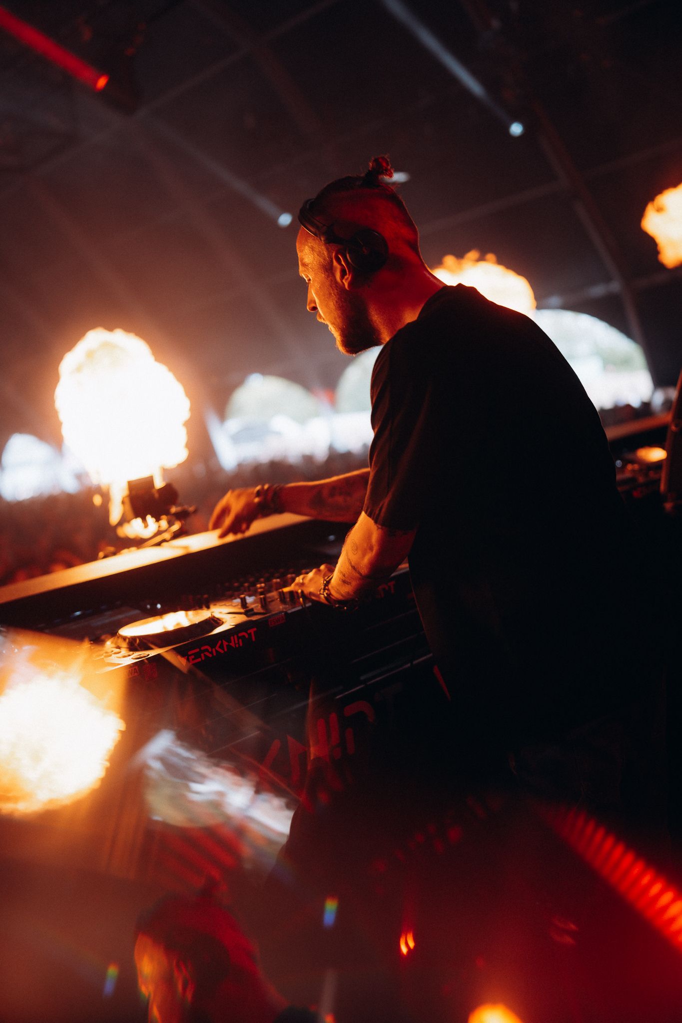 festival atmosphere performance intensity Bradamedia DJ booth techno culture