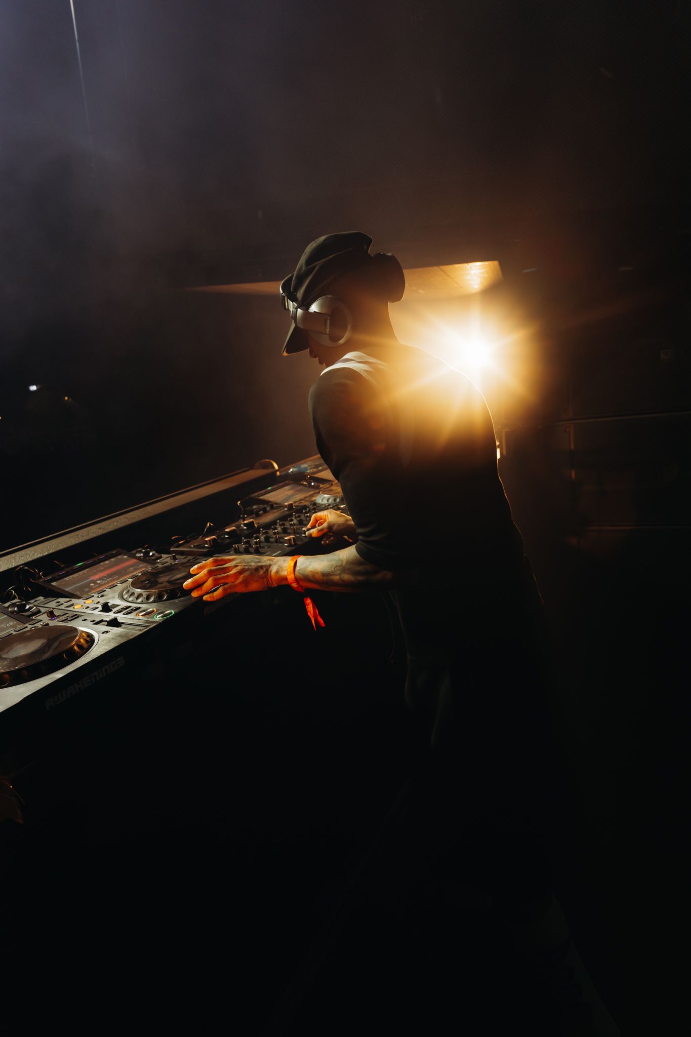 electronic music rave atmosphere Bradamedia intense performance nightlife feeling
