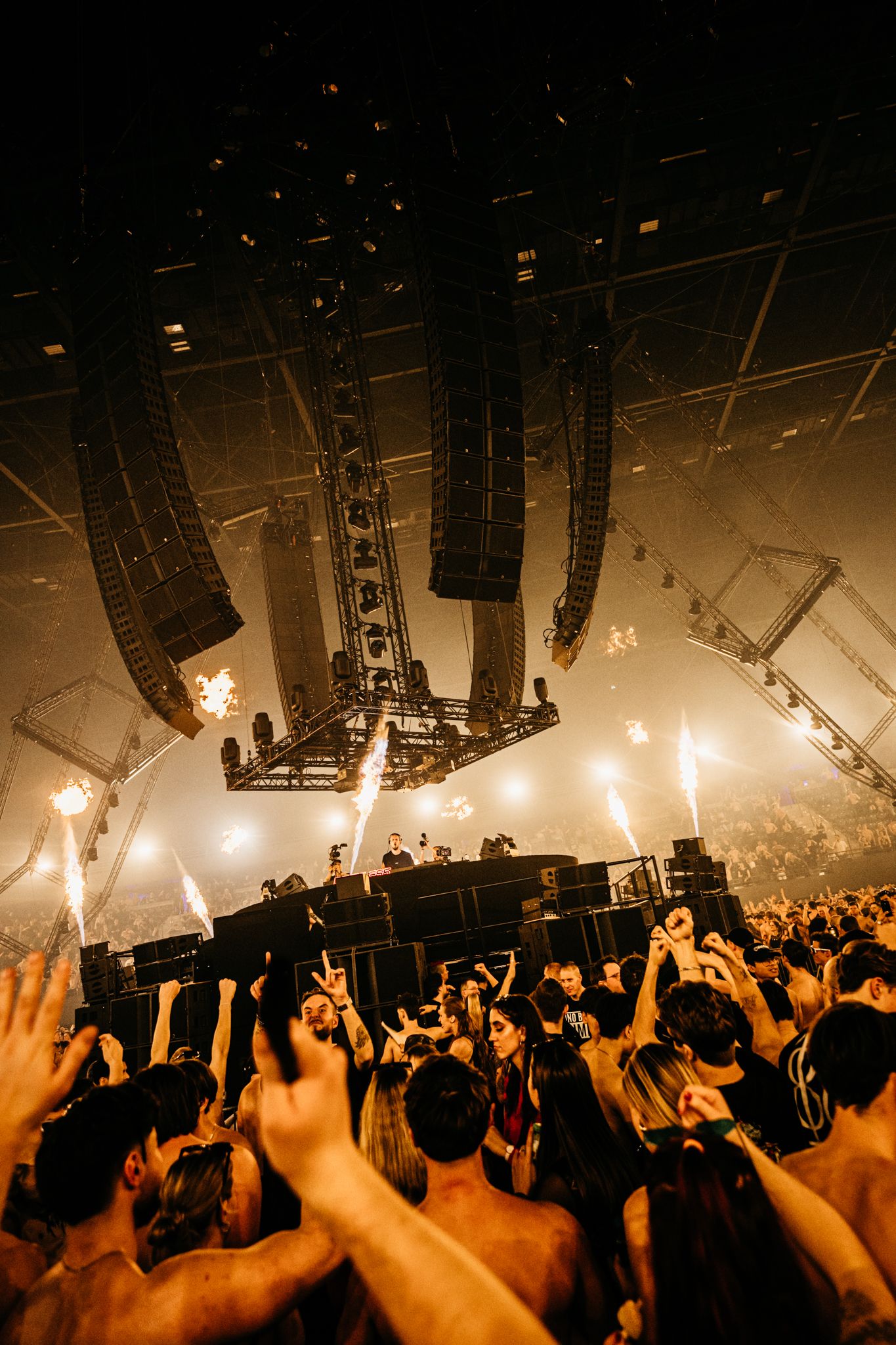 crowd energy heavy techno sound Bradamedia stage lighting performance intensity