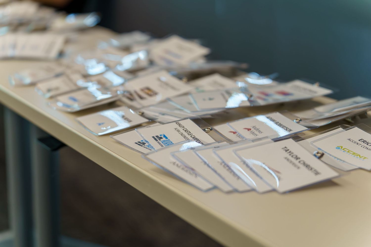 Stacks of paper documents arranged on a table surface.