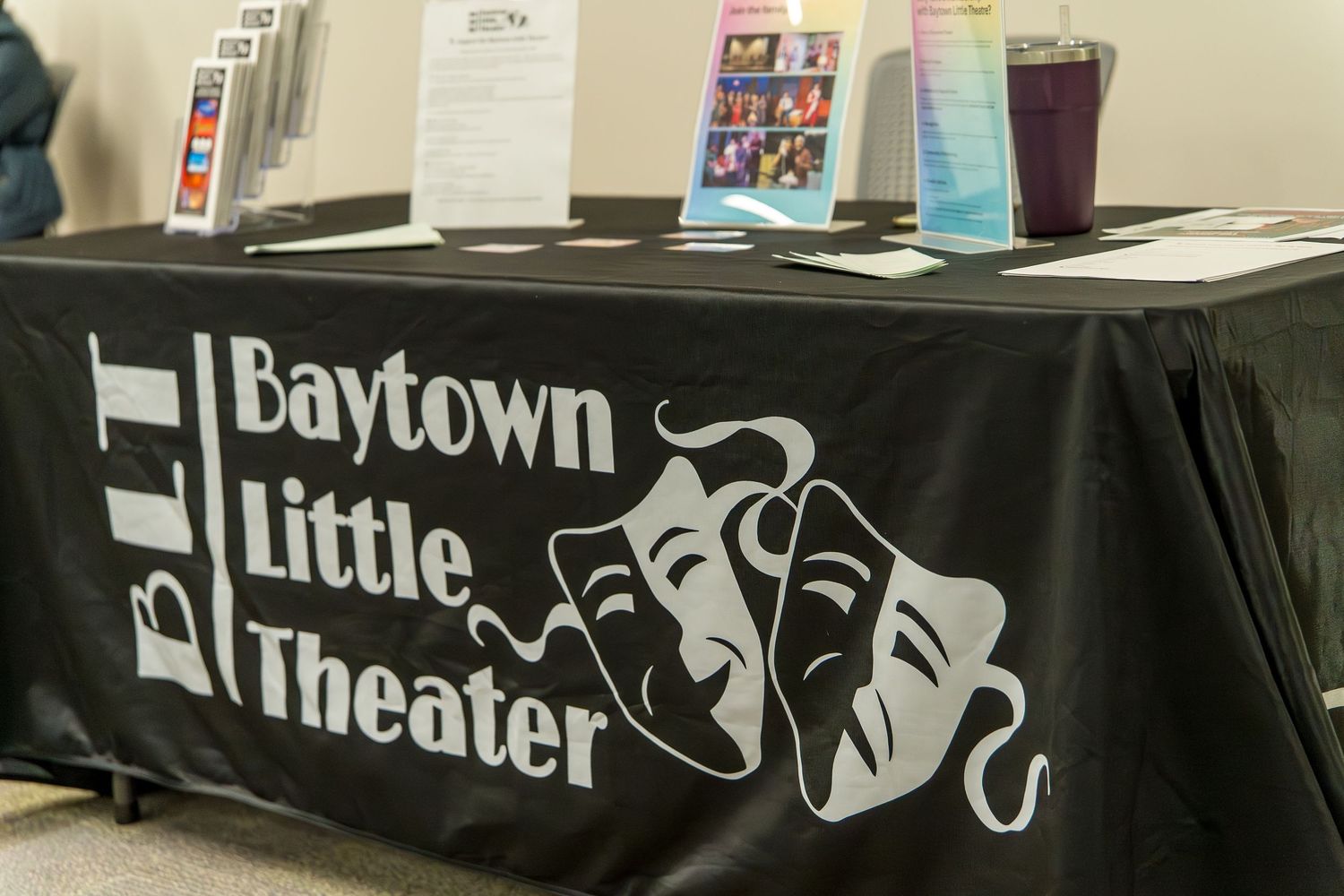Black banner with 'Little Theater' text and comedy/tragedy masks displayed.