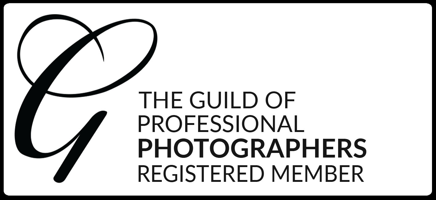 Professional black and white logo design for The Guild of Professional Photographers showing a stylized G symbol.