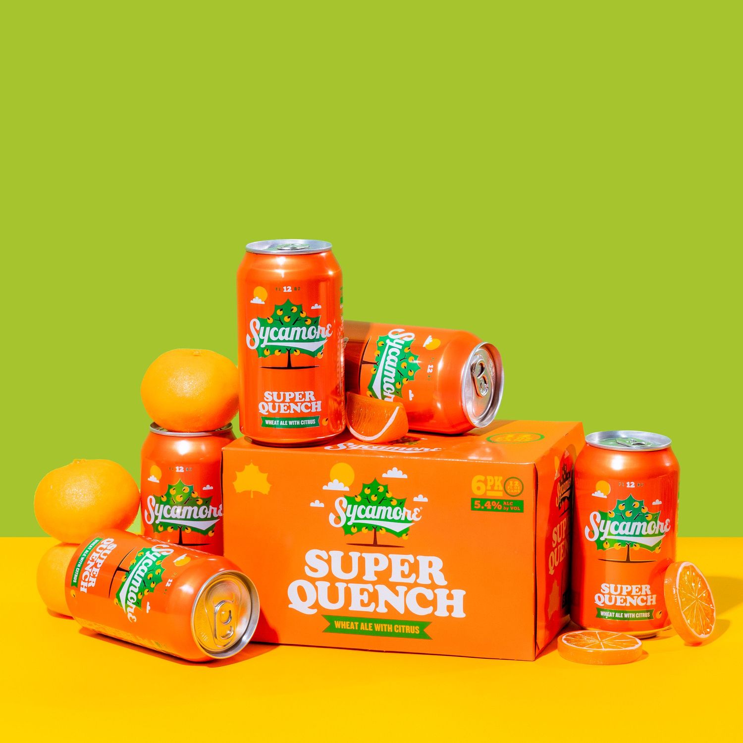 Display of Super Quench orange soda cans on vibrant yellow and green background.