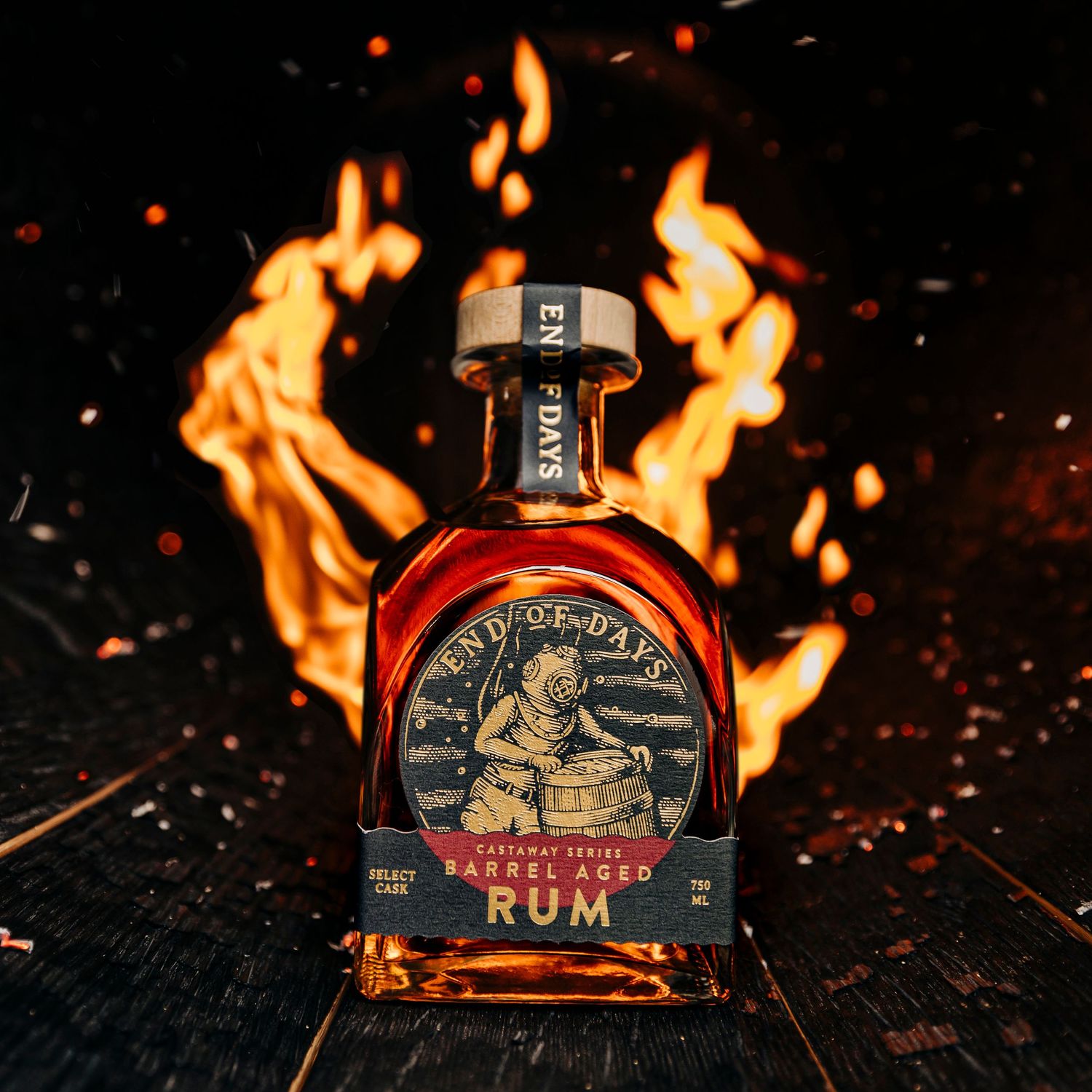 Bottle of Jack Daniel's whiskey with flames in dark background.