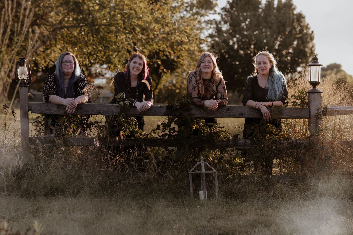 Golden hour outdoor photography session with autumn trees and natural lighting.