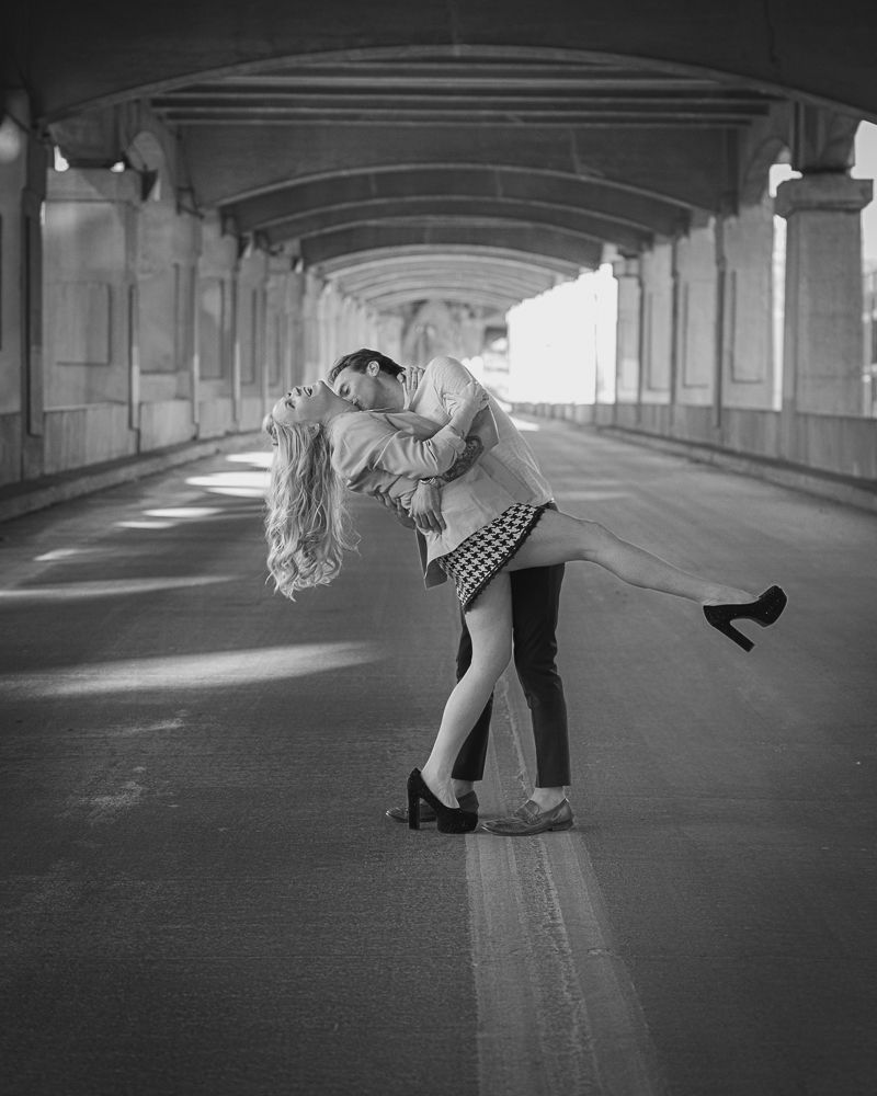 A romantic black and white photo sequence showing a couple dancing in an empty tunnel or underpass.