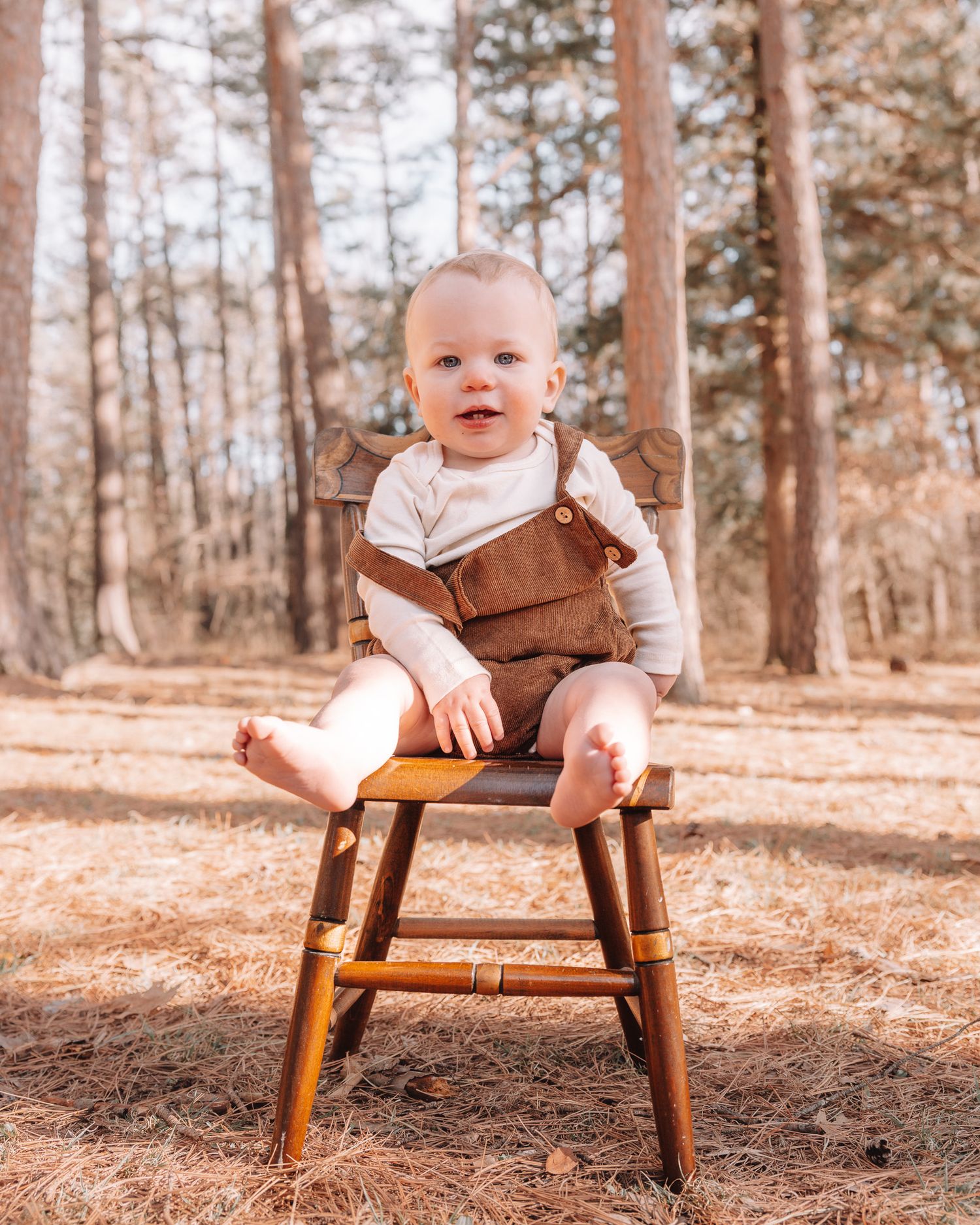 A sequence of photos showing a small child sitting in a wooden chair outdoors in a sunlit forest setting.