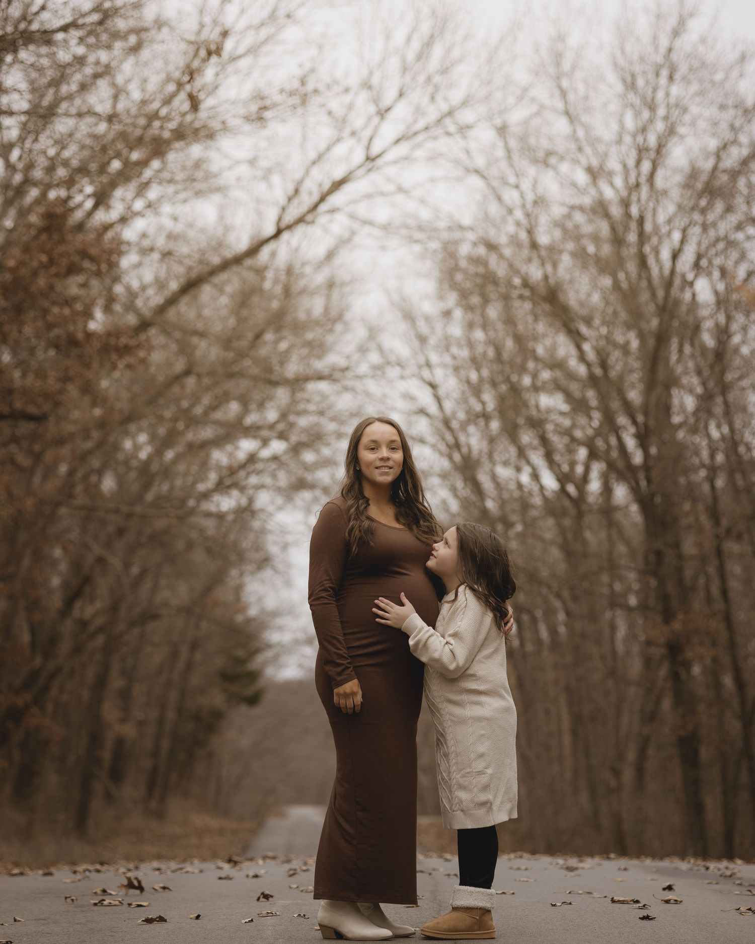 Series of romantic poses captured from ground level showing interaction between two people on a misty path.