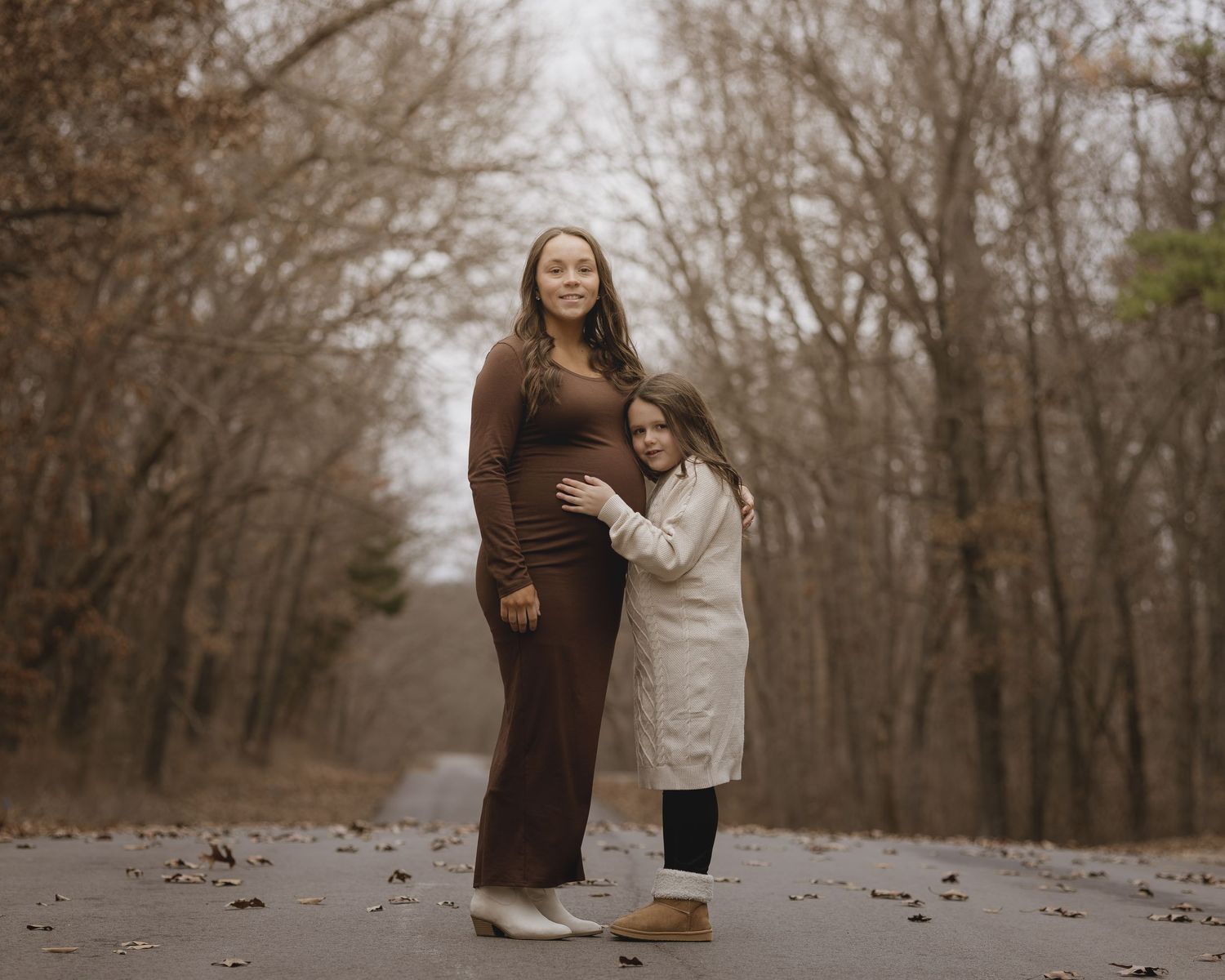 A series of intimate engagement photos capturing tender moments between a couple on a misty forest path.