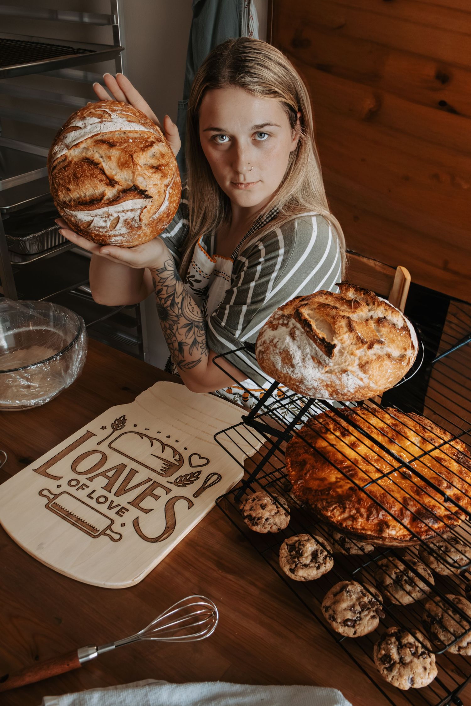 A series of photos showing someone baking homemade pies and pastries on a rustic wooden table with a decorative love sign.