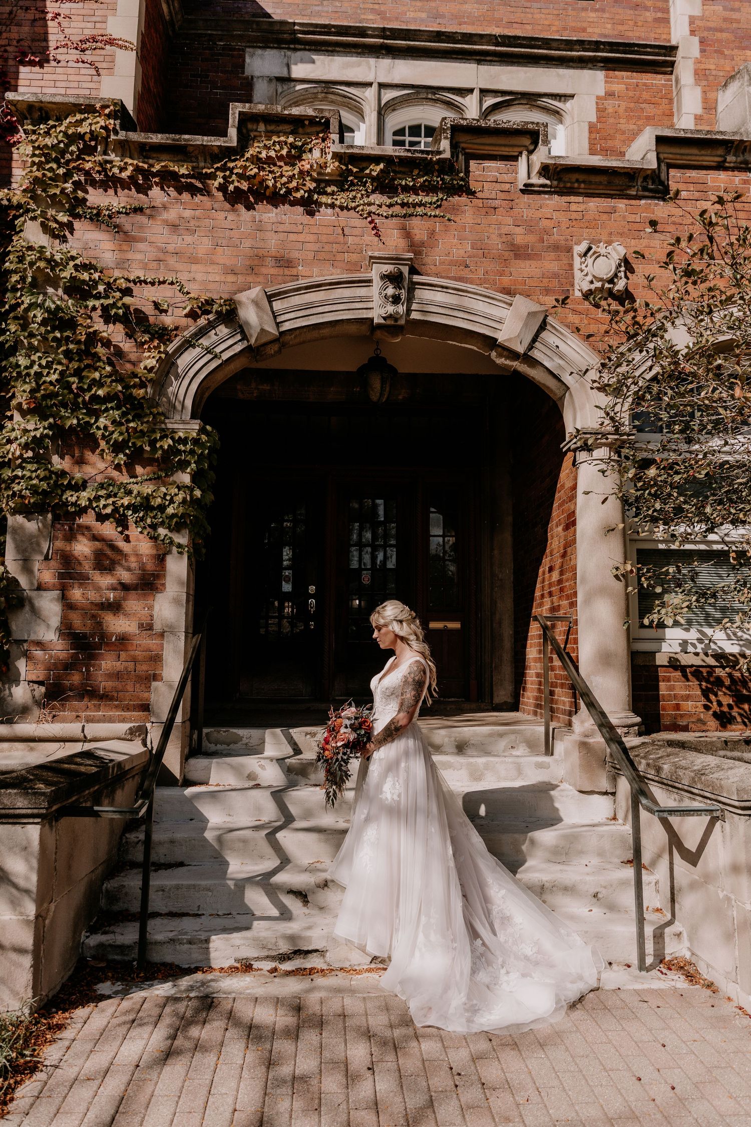 A sequence of photos showing a bride in a flowing white gown twirling on a brick patio outside a historic building.