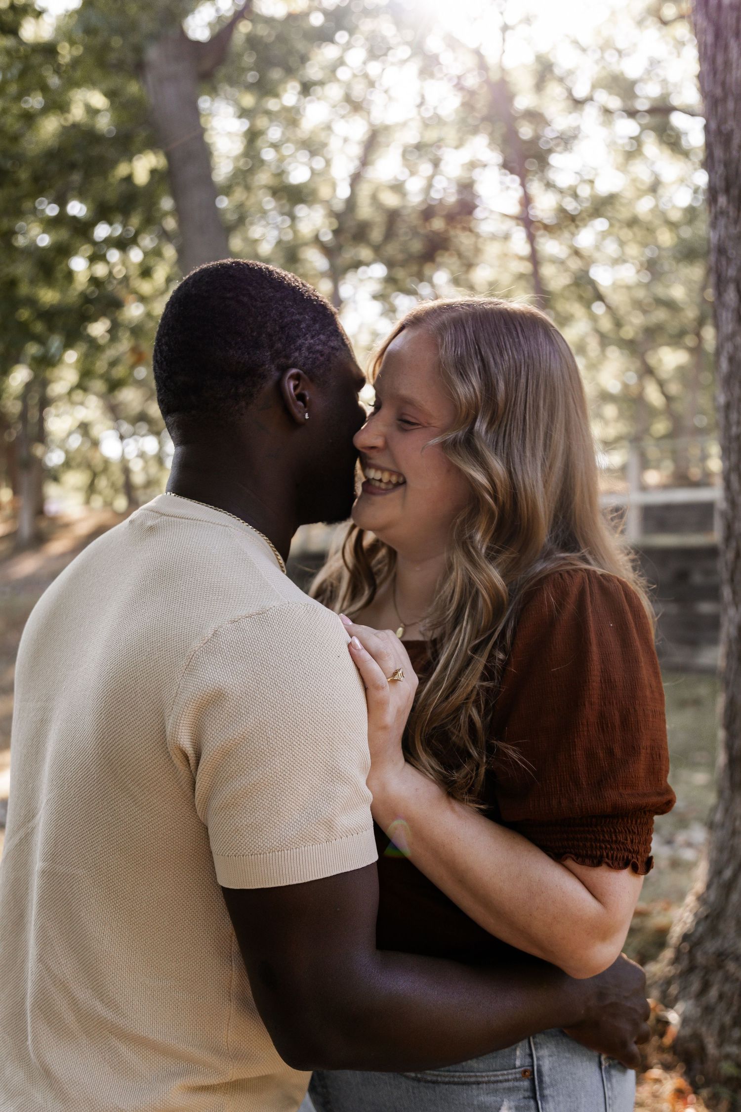 A couple embraces outdoors in a romantic photo sequence showing multiple angles of their tender moment.
