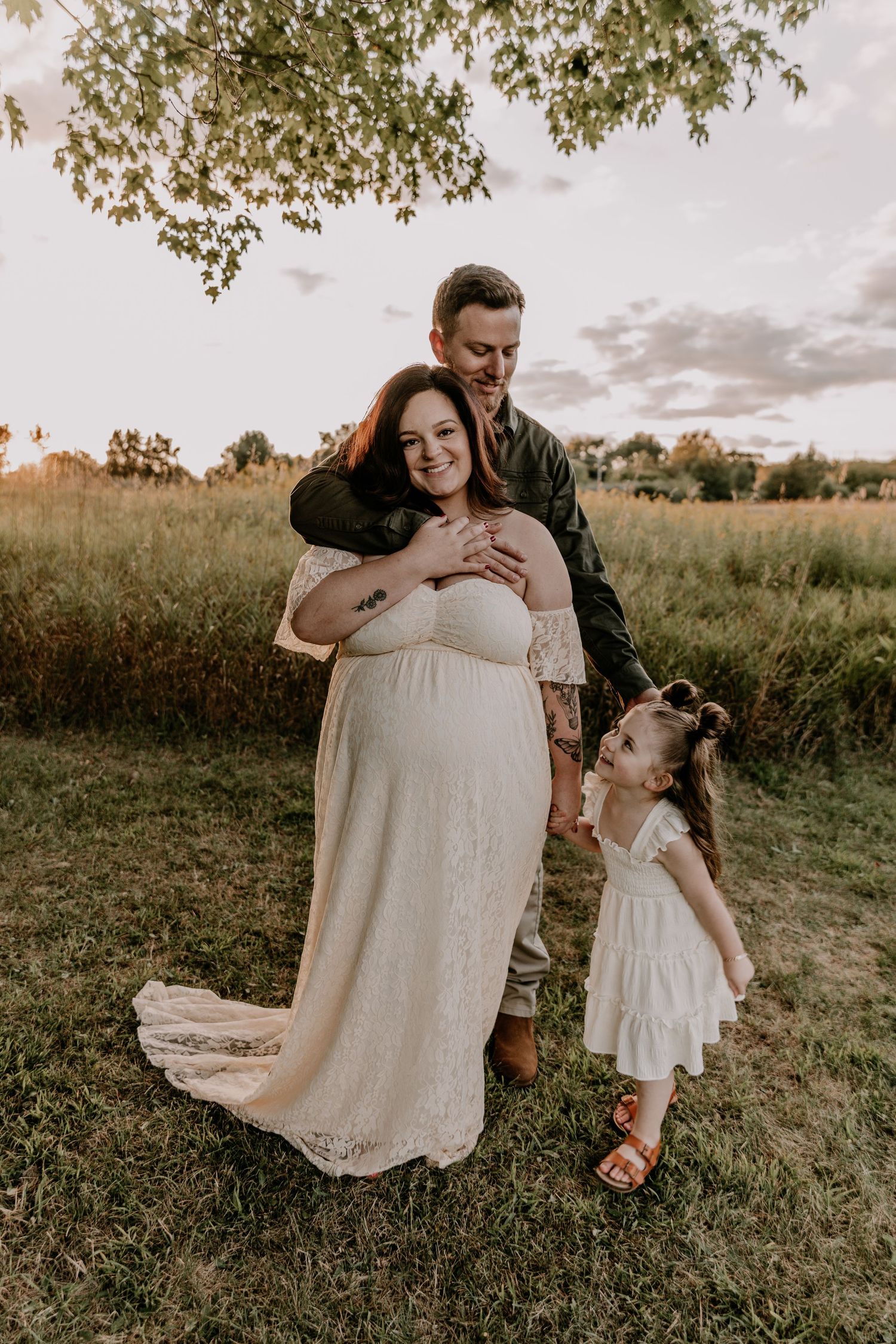In a golden field at sunset, intimate family moments are captured in a series of four tender photos.