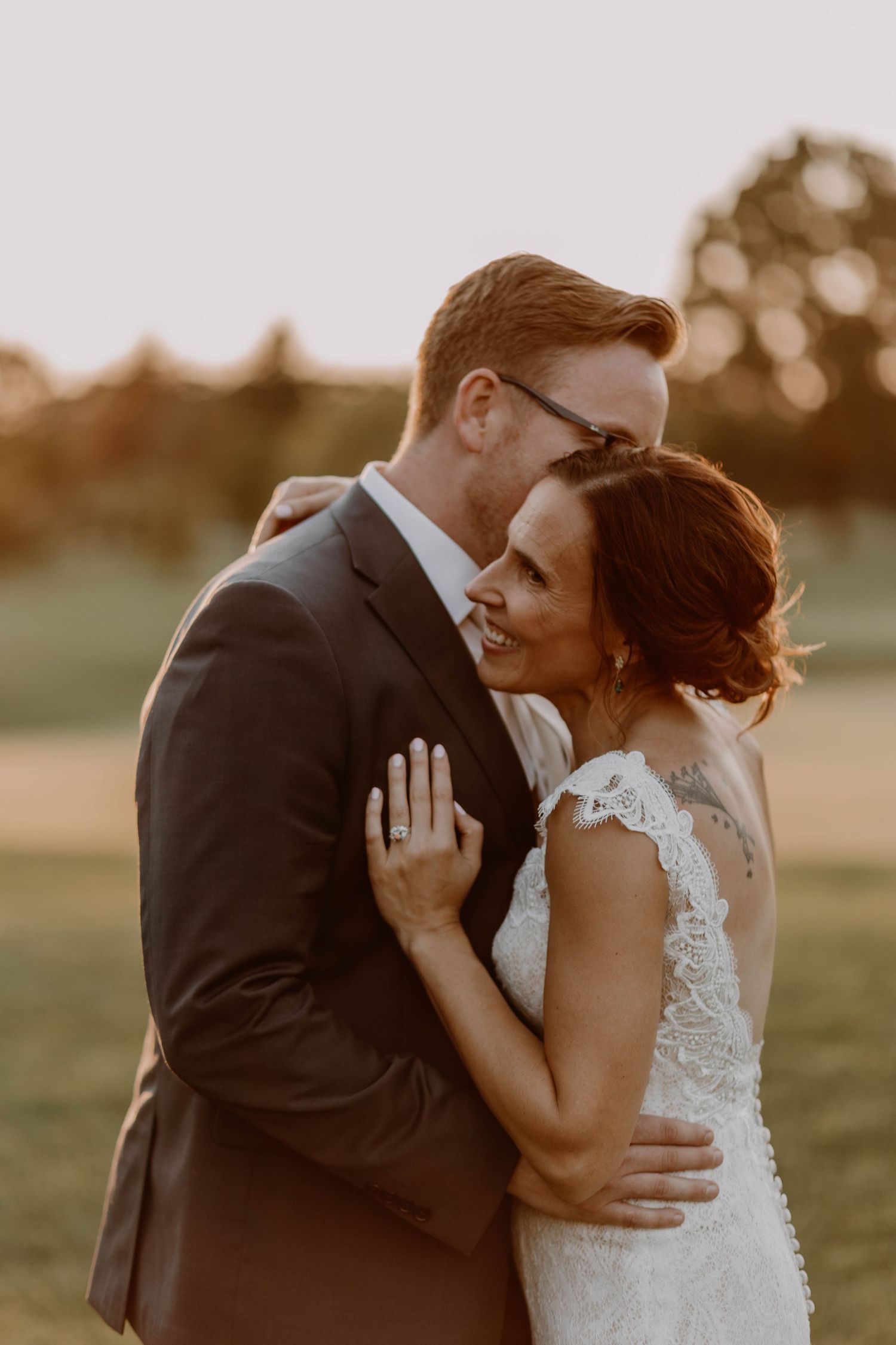 Golden hour wedding portraits showing intimate moments between couple in formal attire.