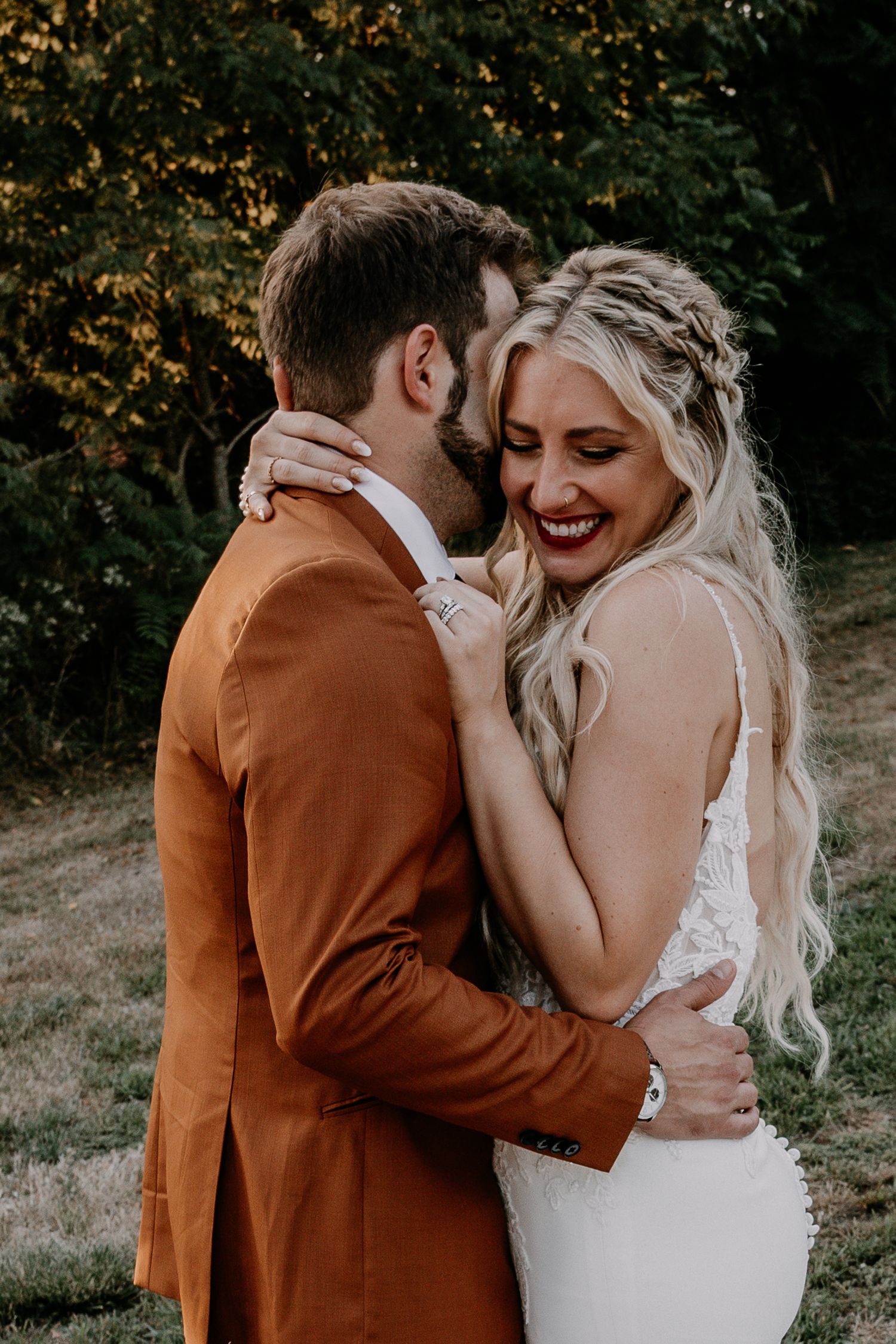 A romantic wedding portrait sequence showing tender embraces between newlyweds in an autumn outdoor setting.