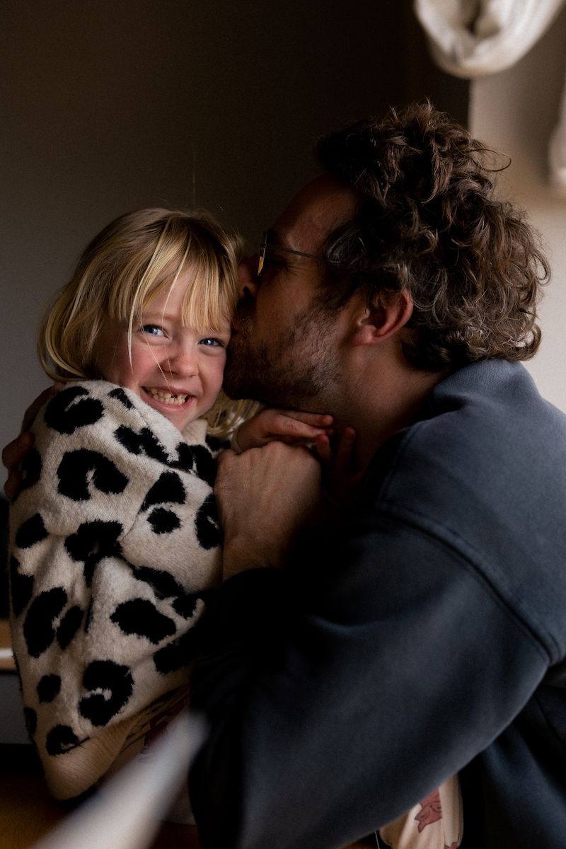 Intimate series of photos showing embraces and connection in moody lighting.
