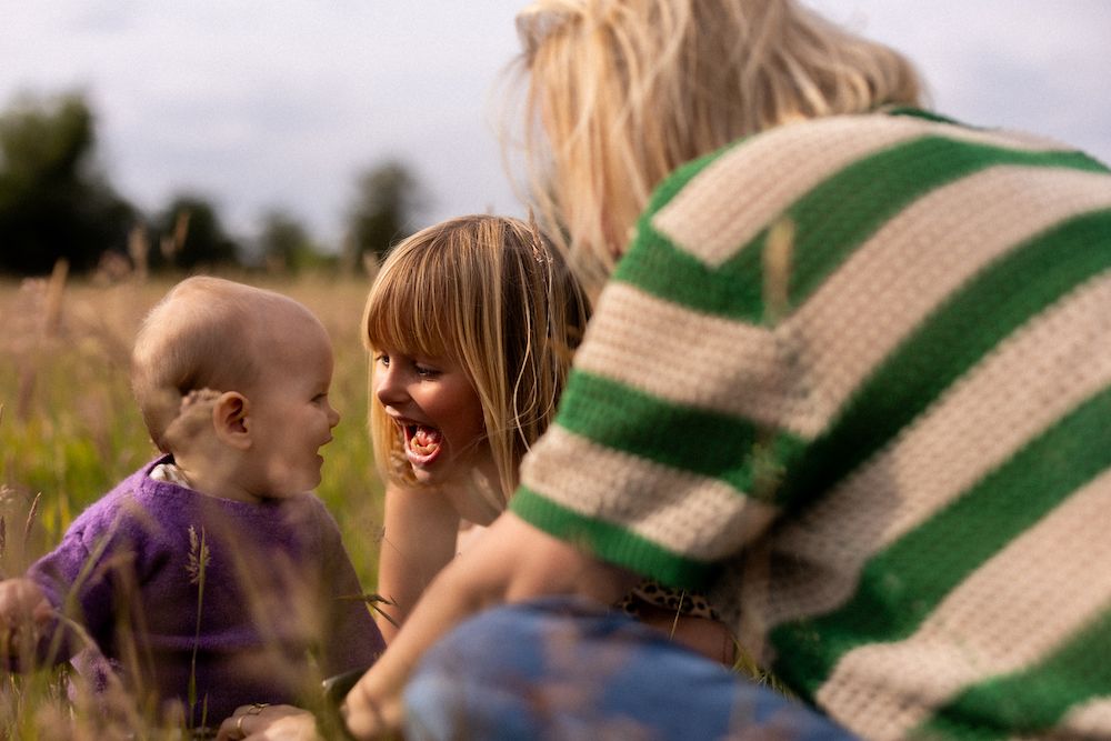 Sequence of gentle interactions in a field on a cloudy day.