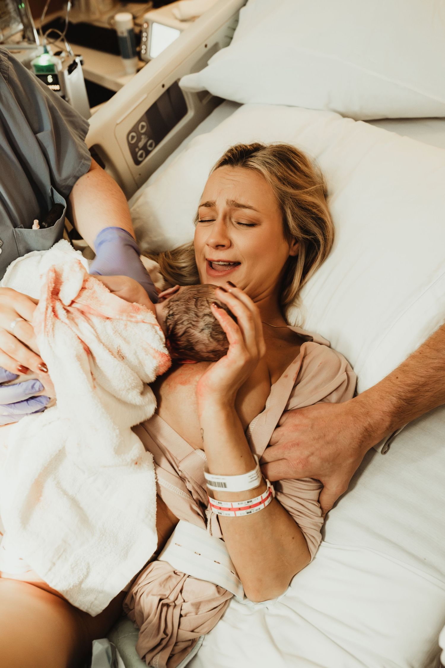 A series of intimate tender moments captured in a hospital maternity ward showing emotional birth celebration scenes.