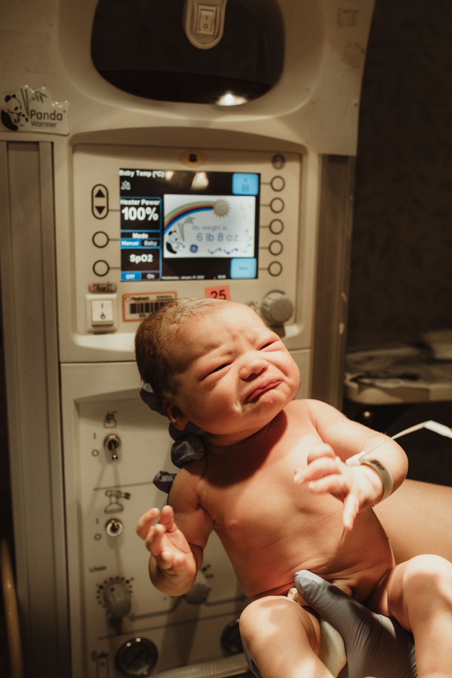 Series of newborn measurements and medical monitoring in a hospital.