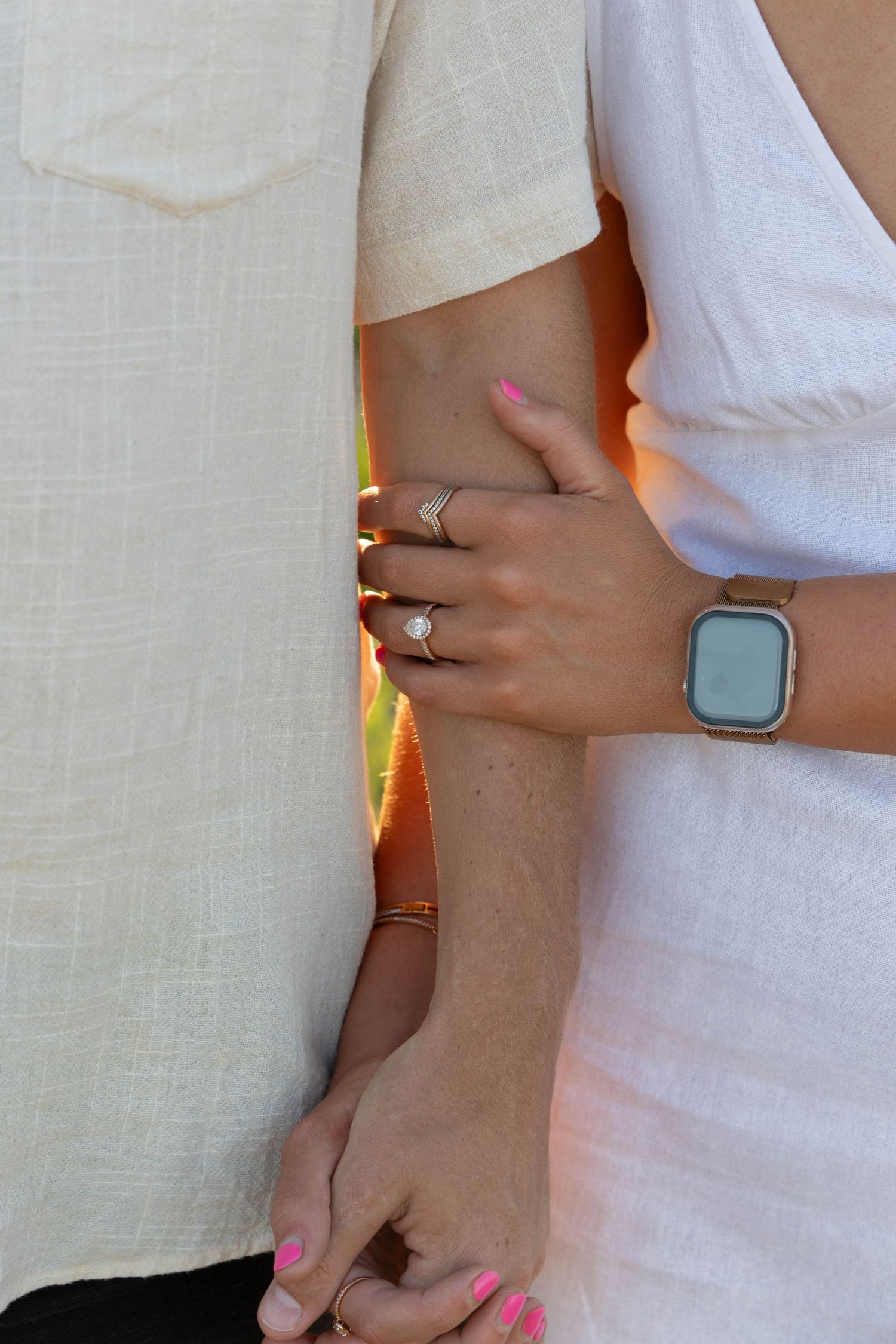 Engagement photos in a field.