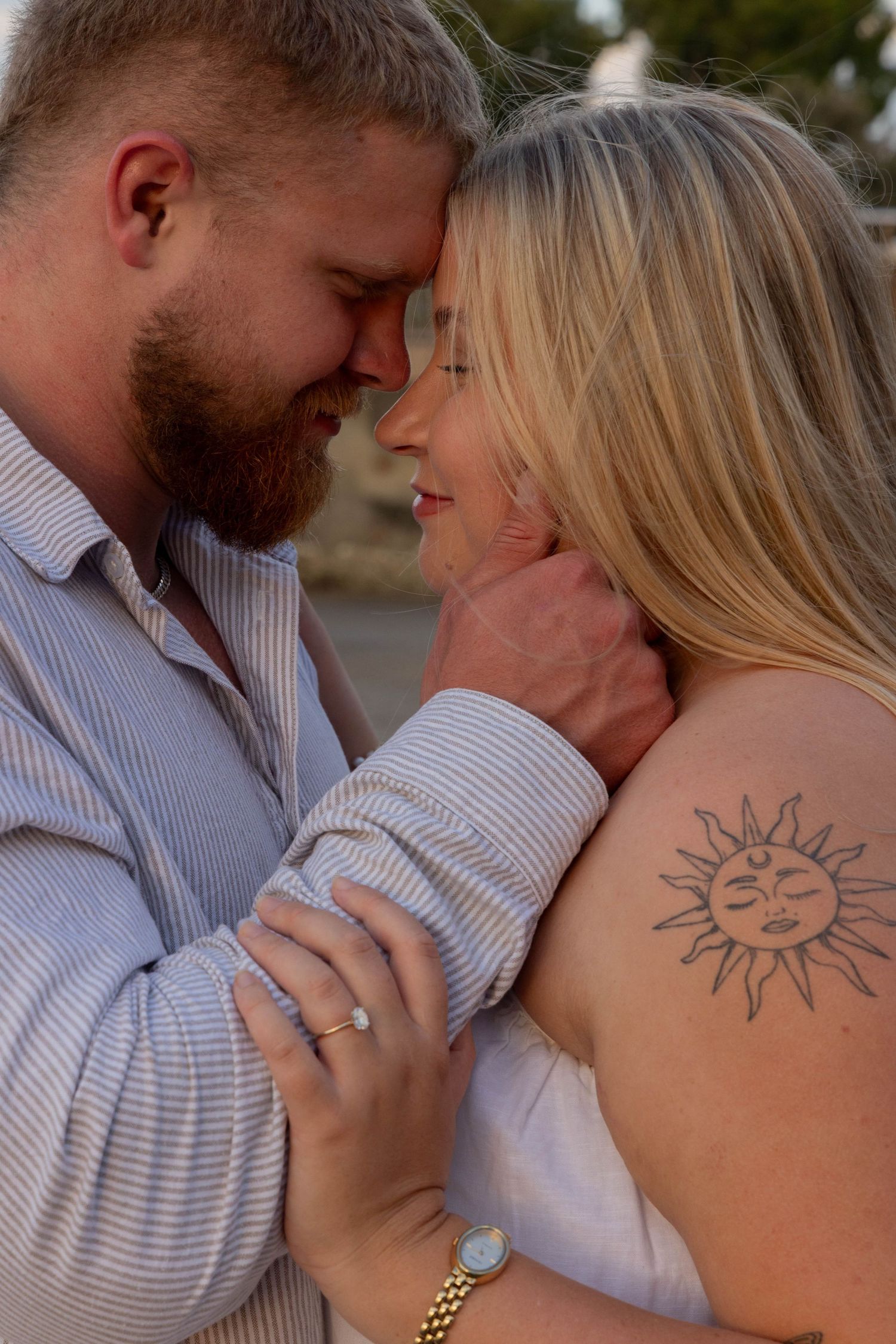 Engagement photos at the beach at sunset.
