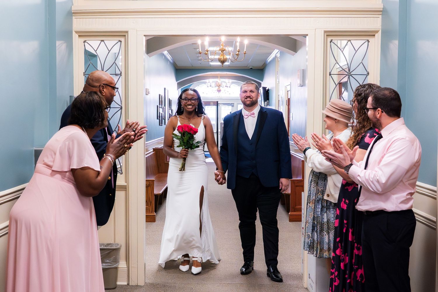 Wedding couple celebrating wedding in Snow Hill Courthouse