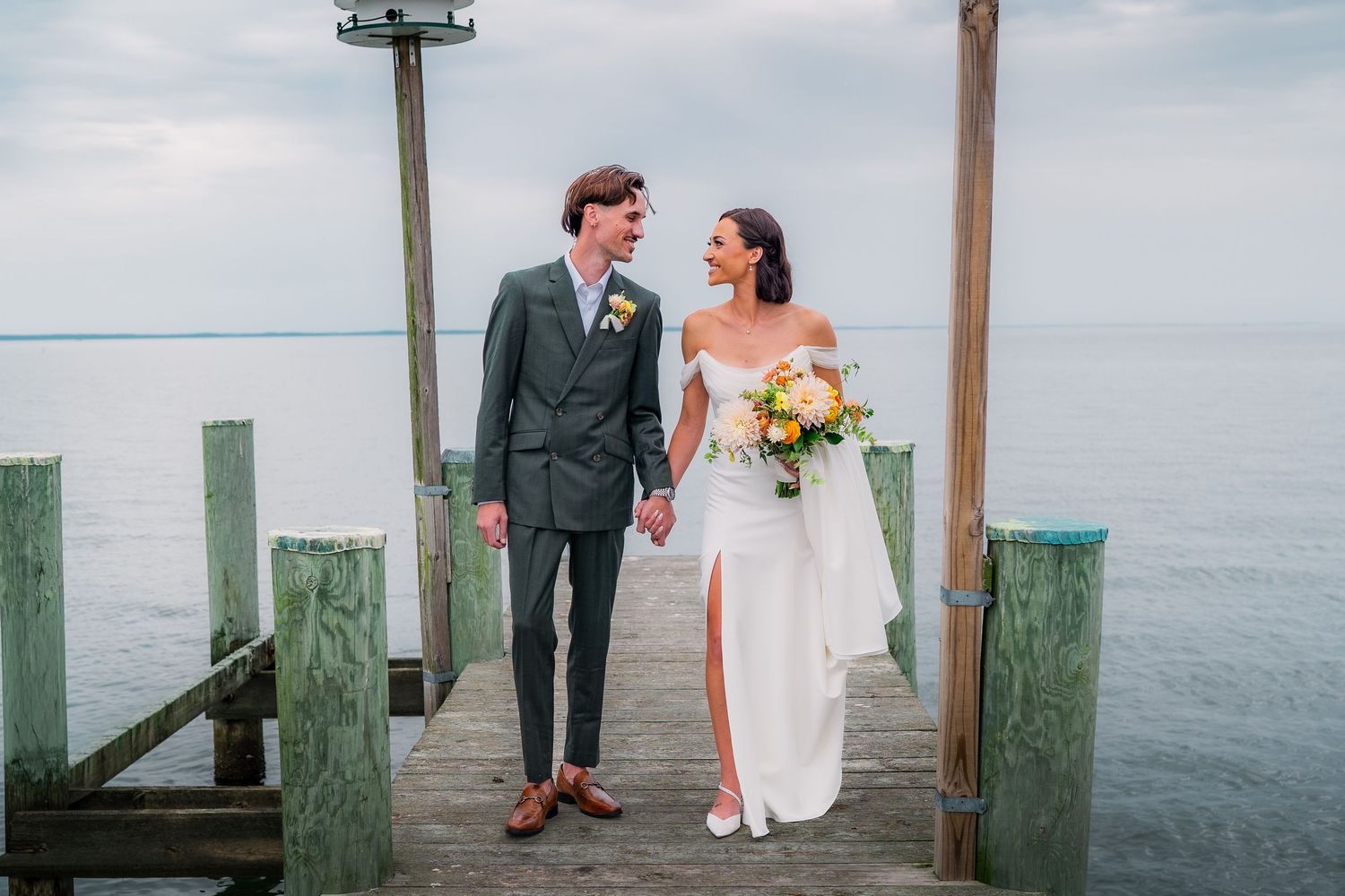 Wedding couple on dock bay in Eastern Shore