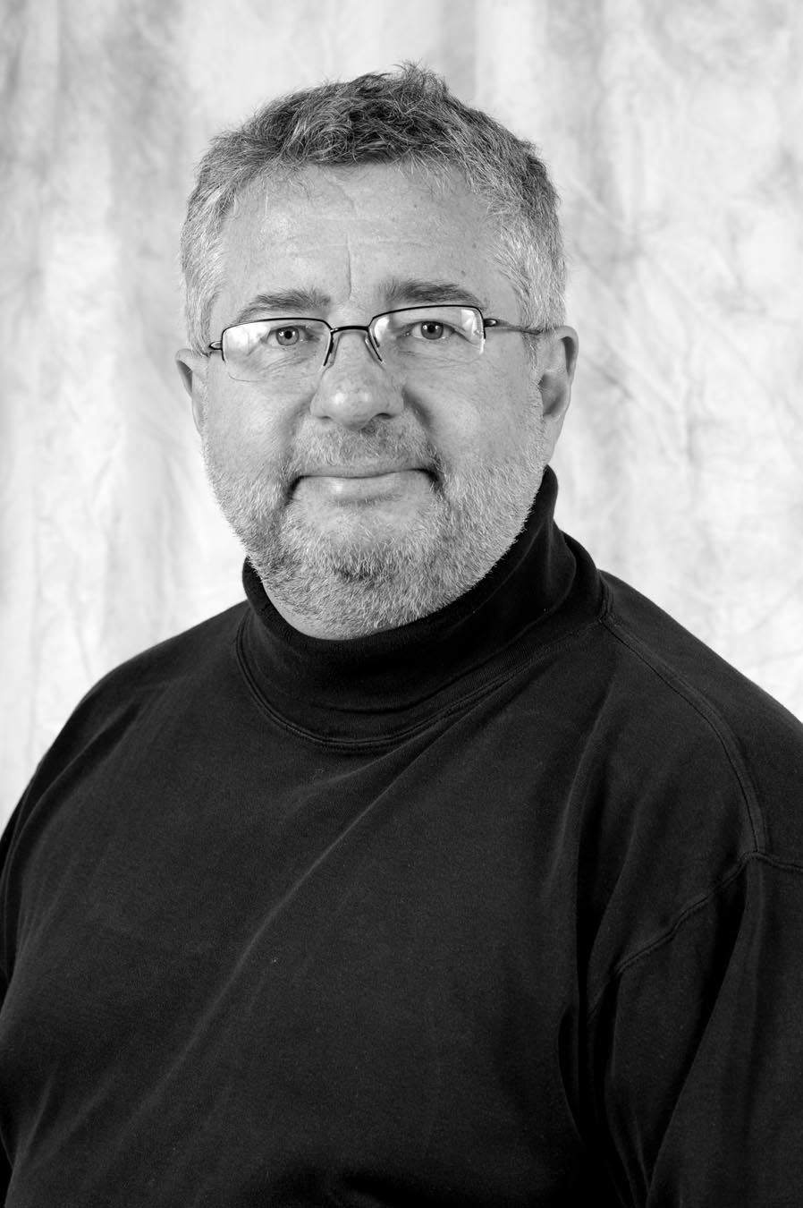 Black and white portrait series showing different expressions in turtleneck sweater.