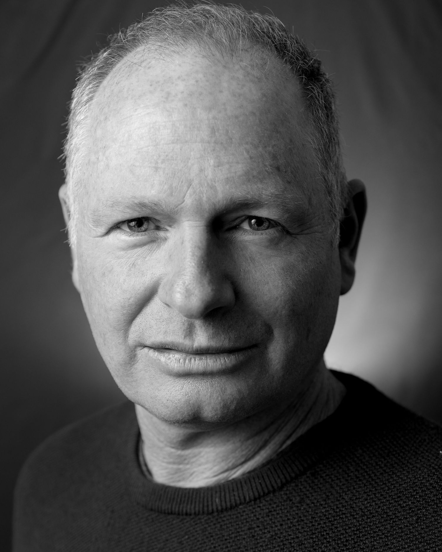 black and white portrait taken of someone in the village