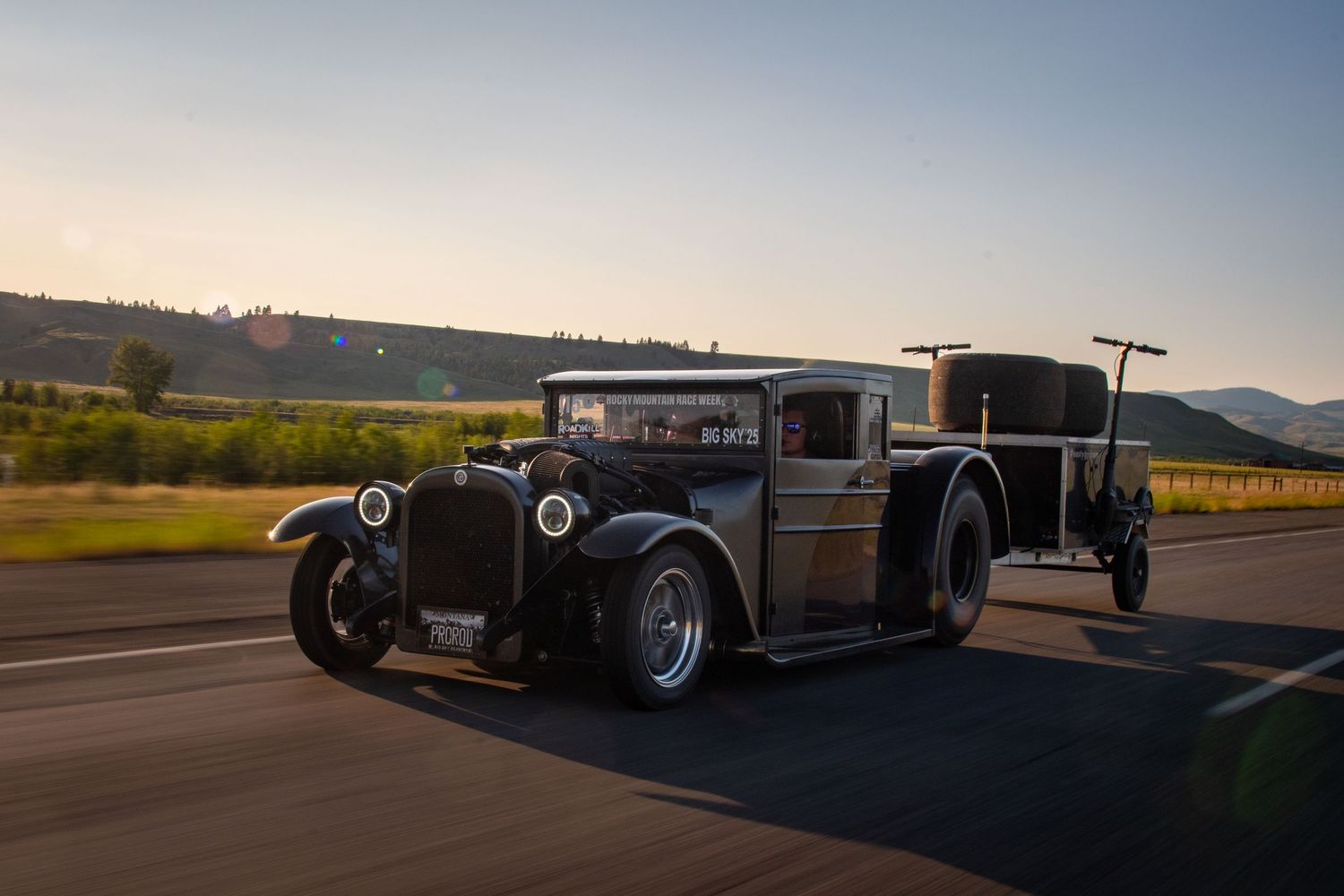 street legal race car driving in the plains of Montana with a beautiful sunset.  Dodge 3rd gen hemi powering this antique truck turned race.
