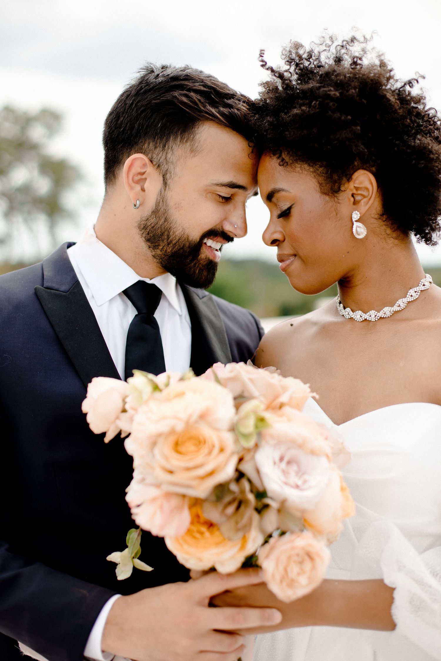 Wedding photo sequence featuring intimate moments with peach roses and elegant jewelry.