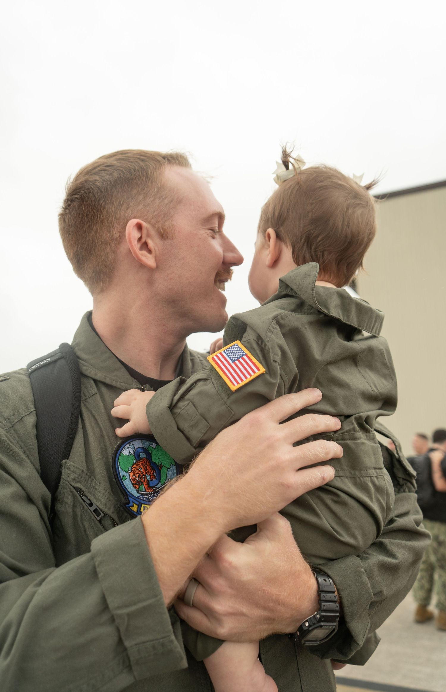 NAS Jax Homecoming  - Dad and daughter embracing