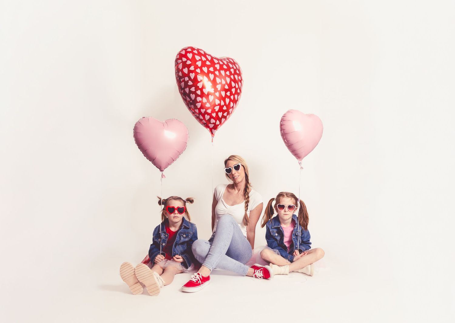 Four Valentine's Day themed photos with heart balloons and pink decorations against white backgrounds.