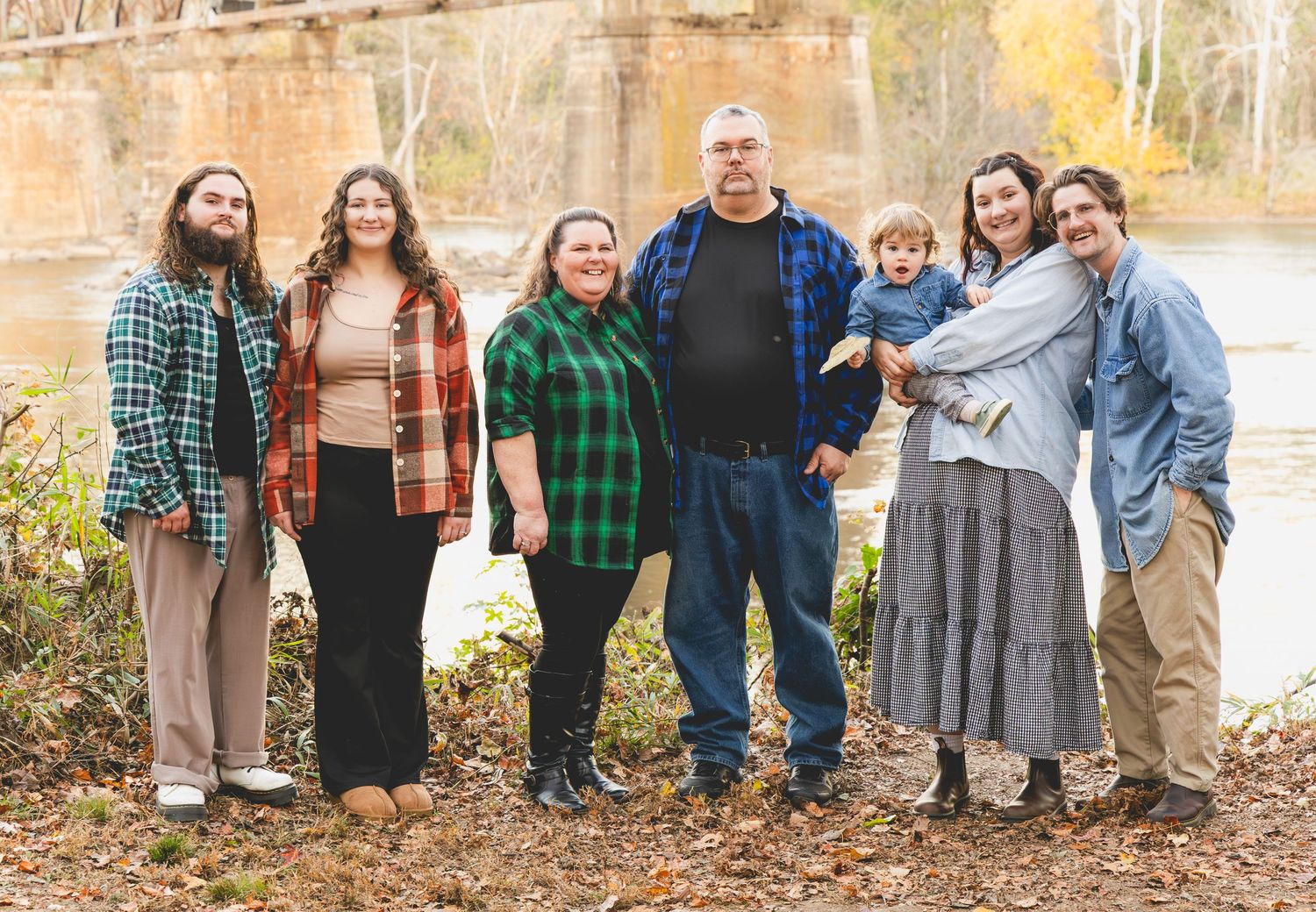 Extended family group photos taken outdoors during fall season.
