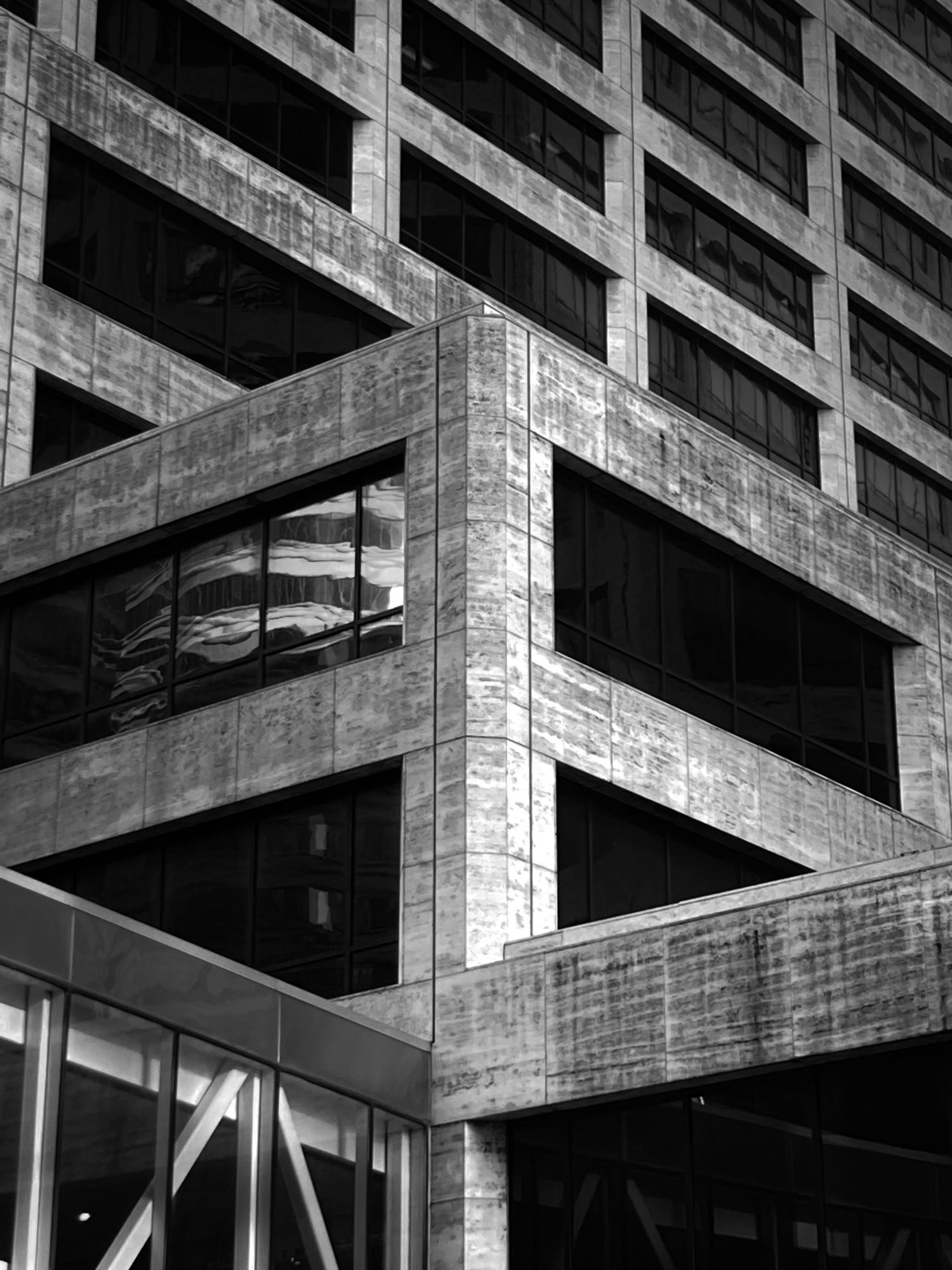 Photo of a corner of a building in black and white.