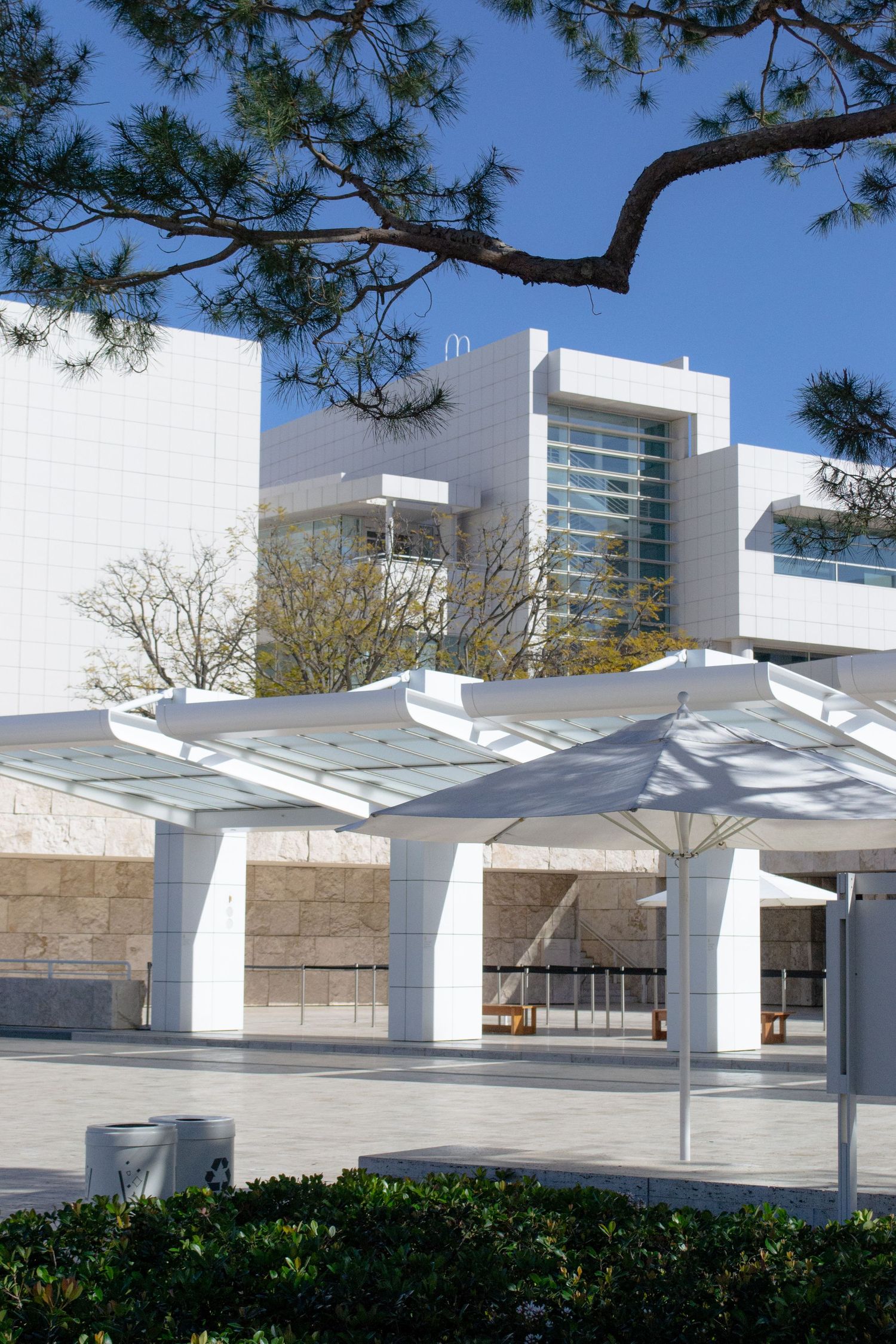 A tram station to the Getty in Los Angeles with three shelters