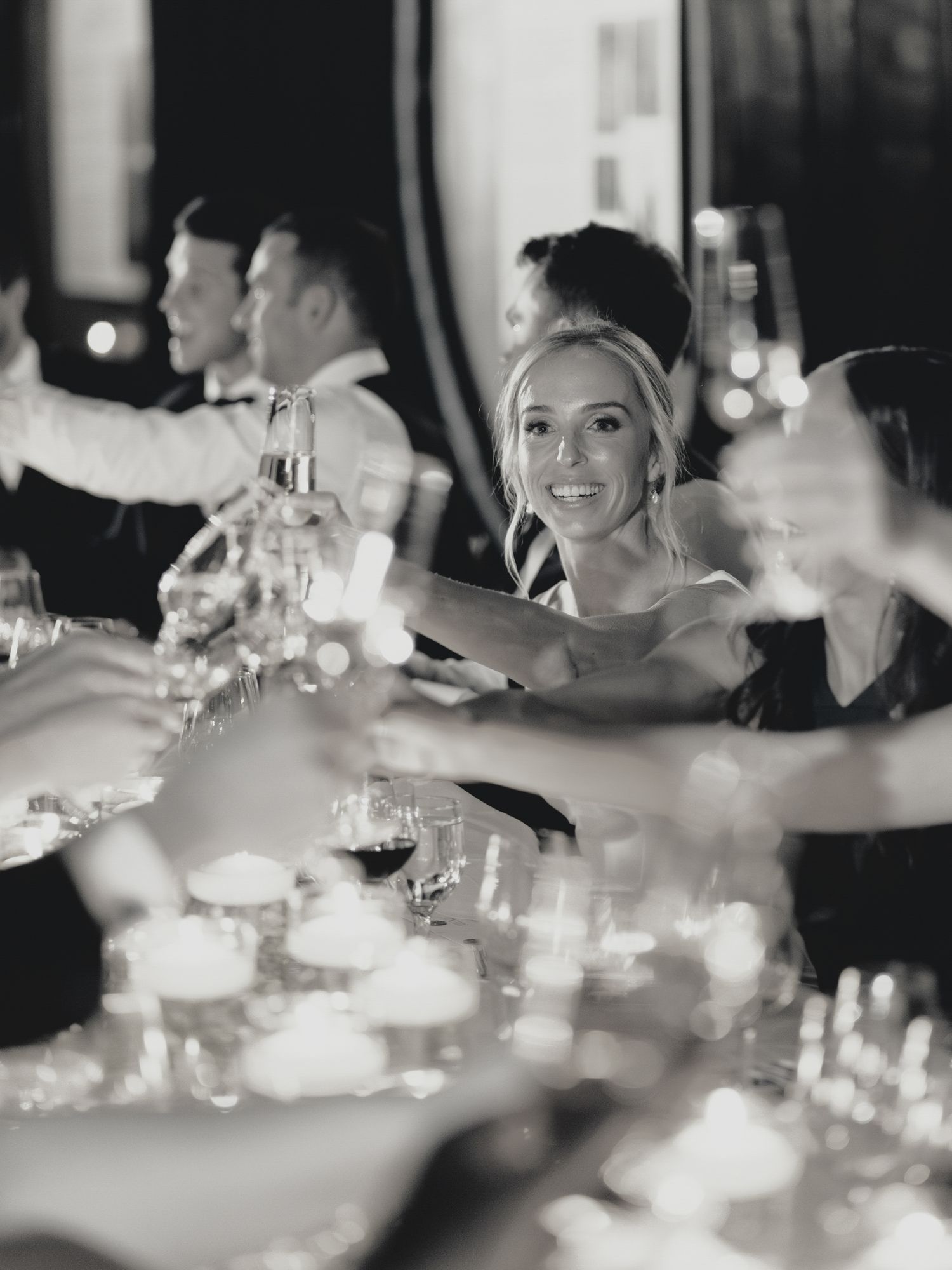 Wedding reception dinner table at Greystone in St. Helena with candlelight creating an elegant ambiance.